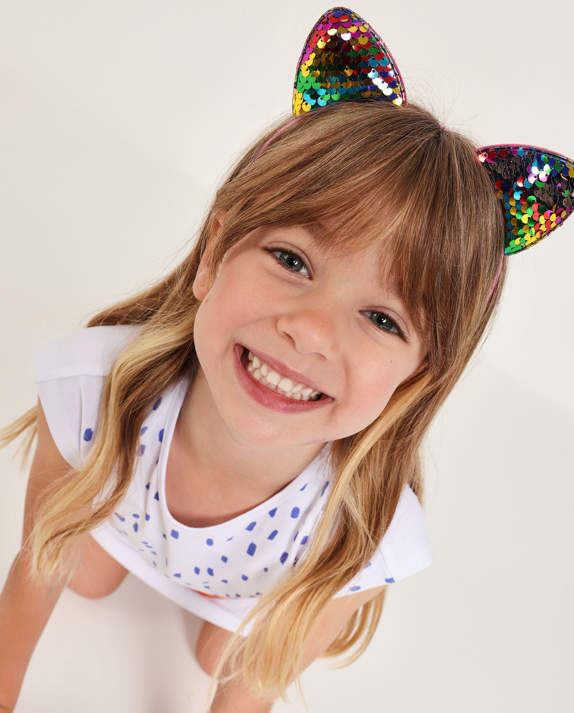 Diadema de niña de plana con orejitas de lentejuelas
