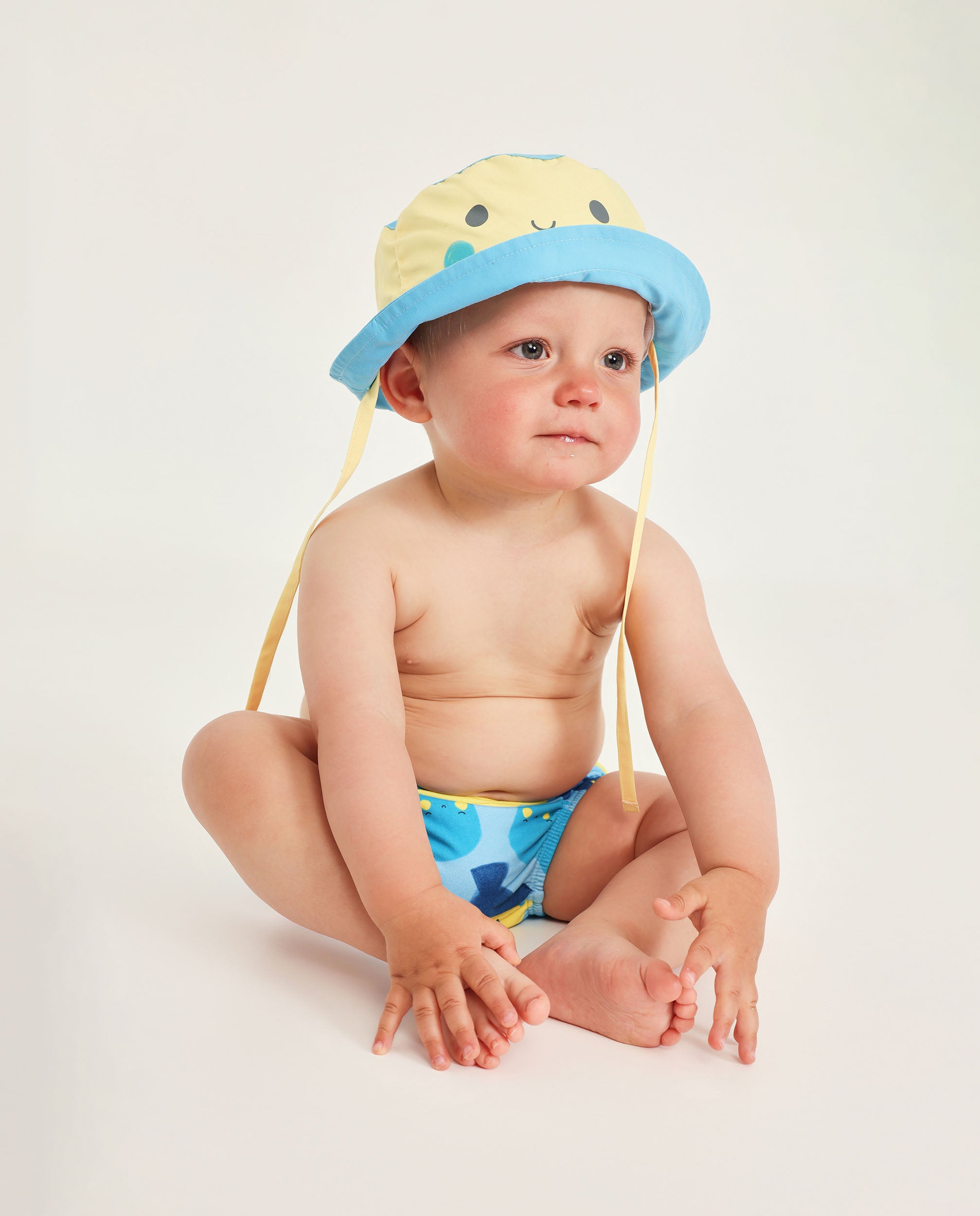 Conjunto de baño para recién nacido con gorrito protector UPF 50+