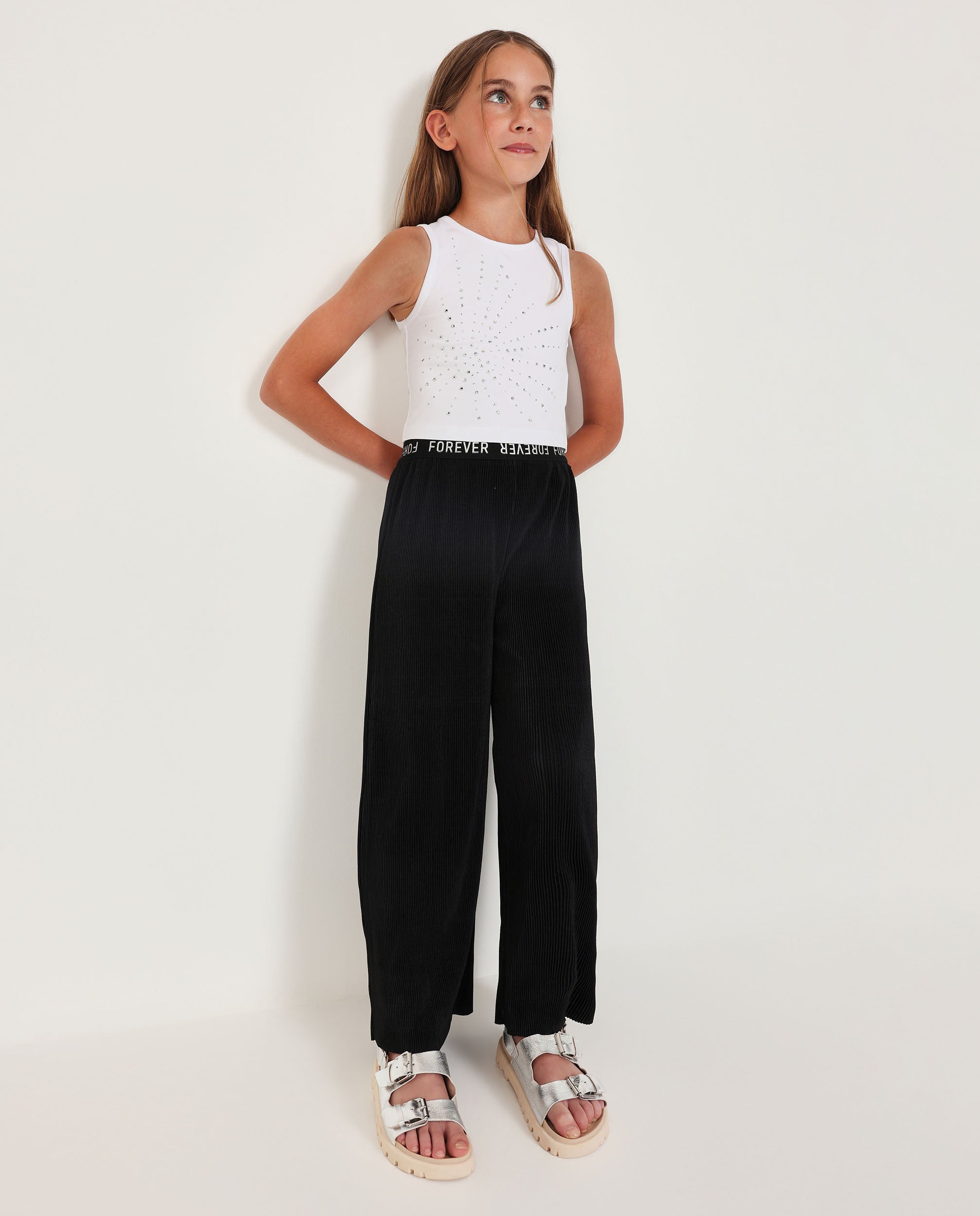 Pantalones de niña de punto con tejido canalé