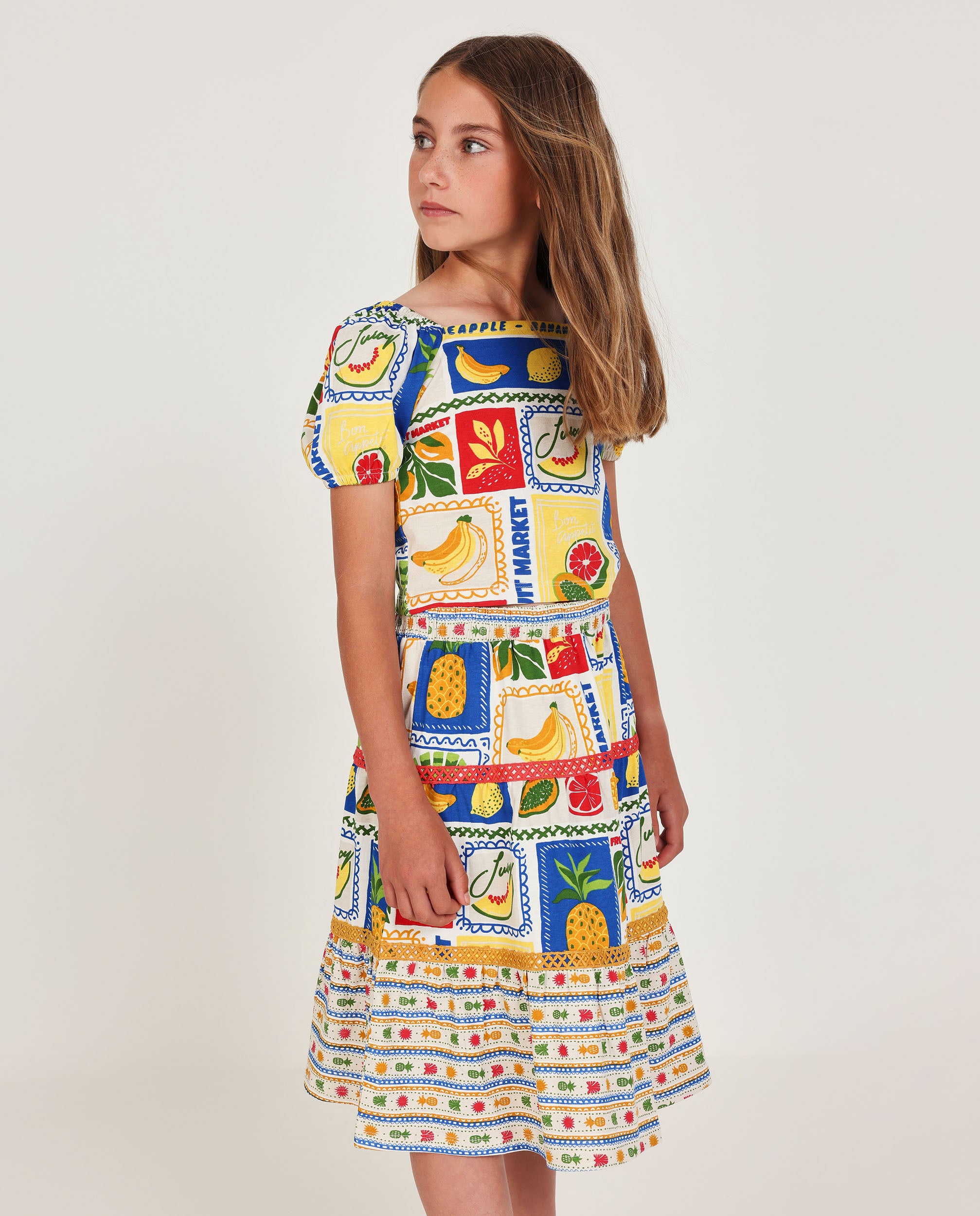 Falda de niña de punto con cintas decorativas
