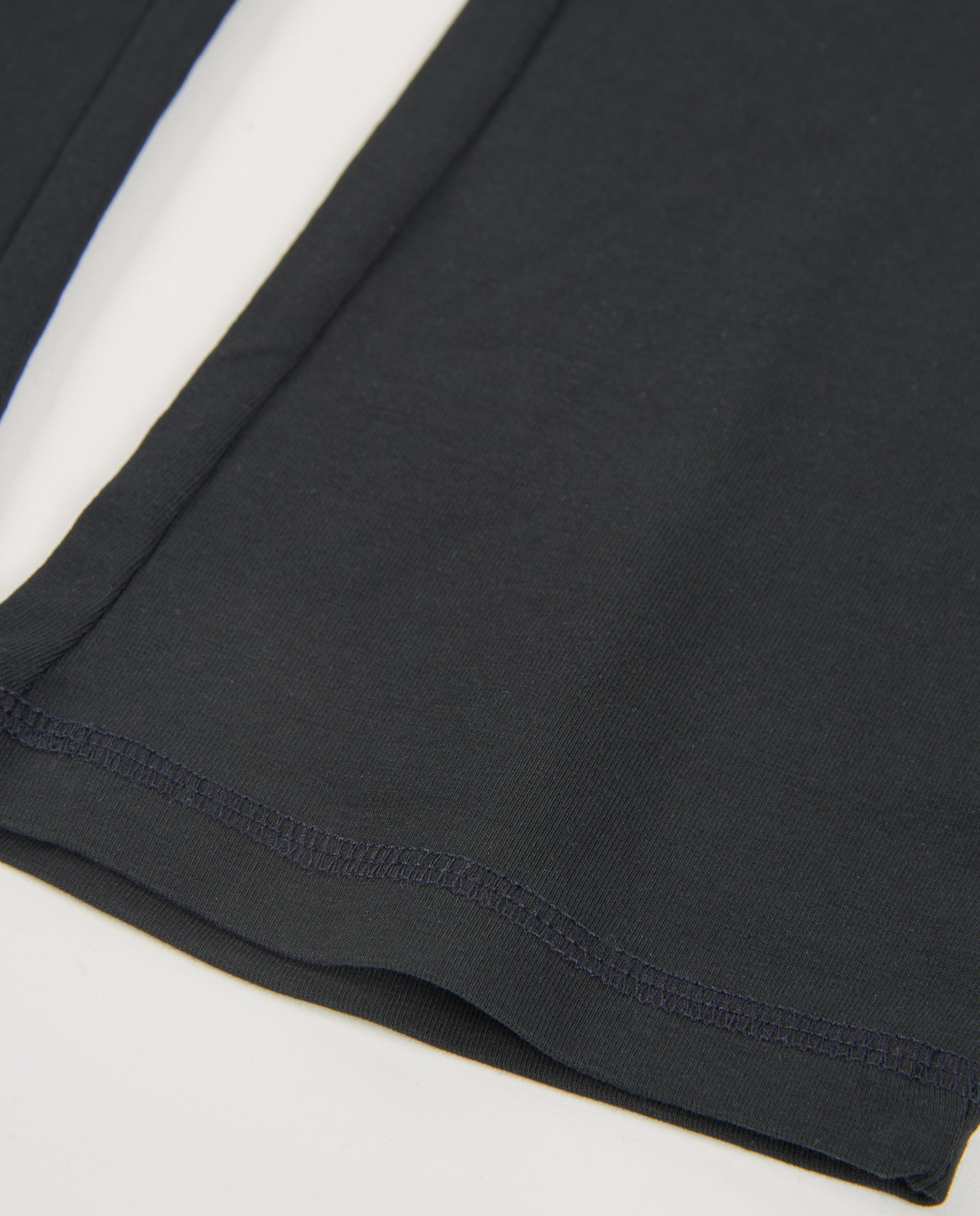 Pantalón de niña de punto con corte acampanado y cintura alta