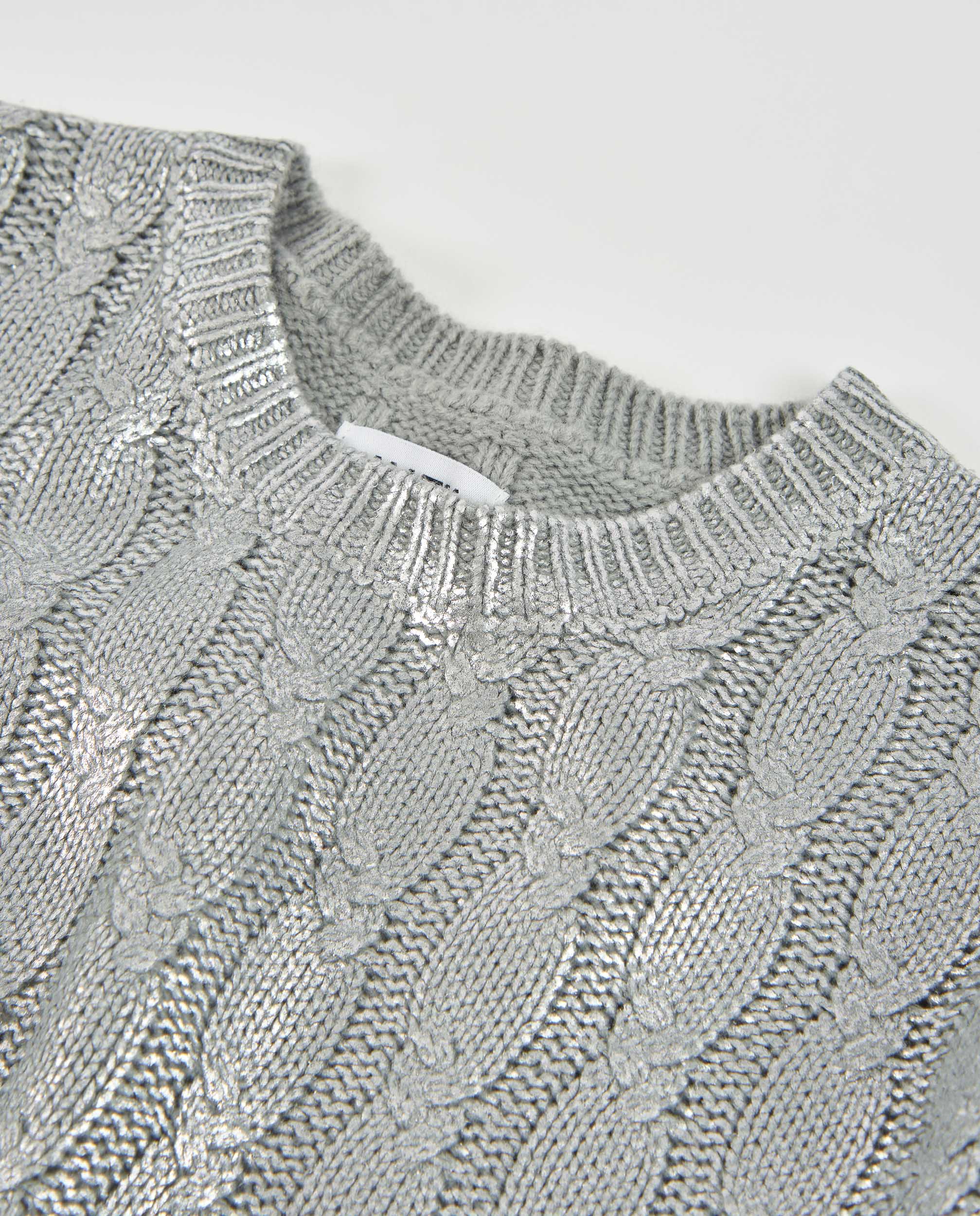 Jersey de niña de tricot de canalé con tonos plateados