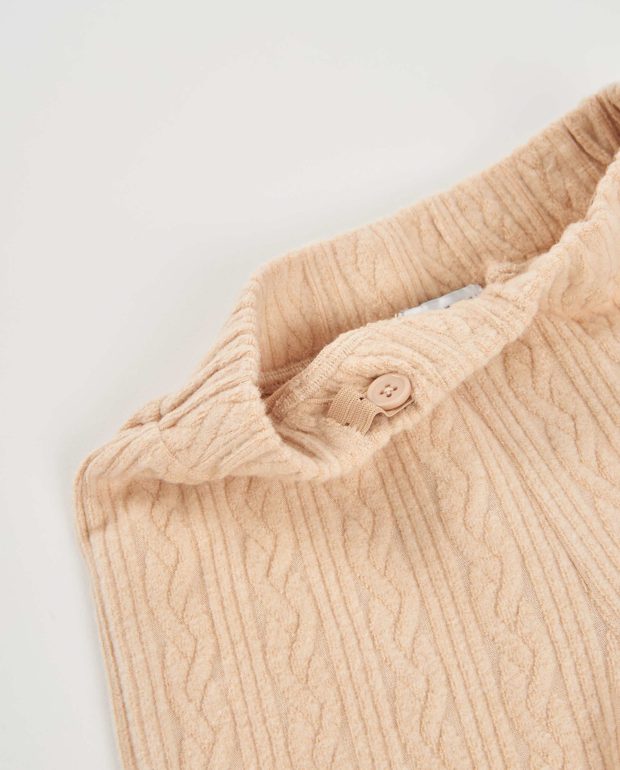 Pantalón de niña de tricot con pierna ancha y acabado texturizado