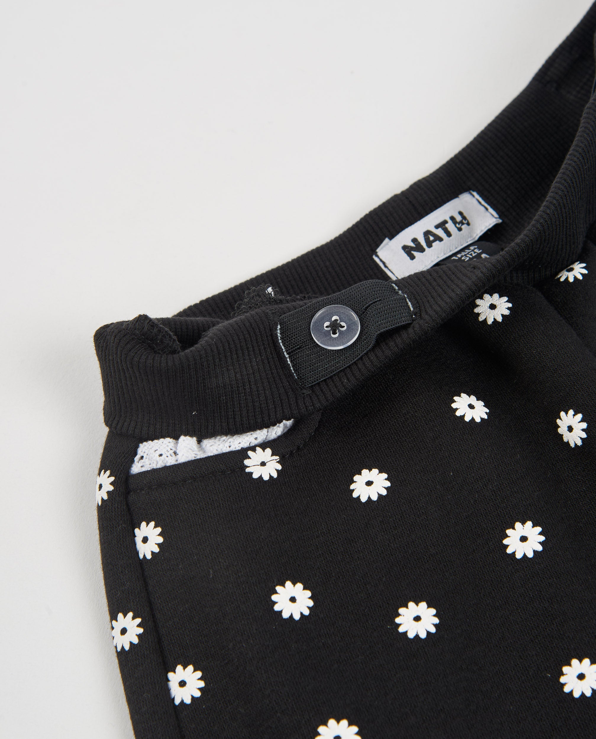 Pantalón de niña de felpa con pierna ancha y diseño integral de flores