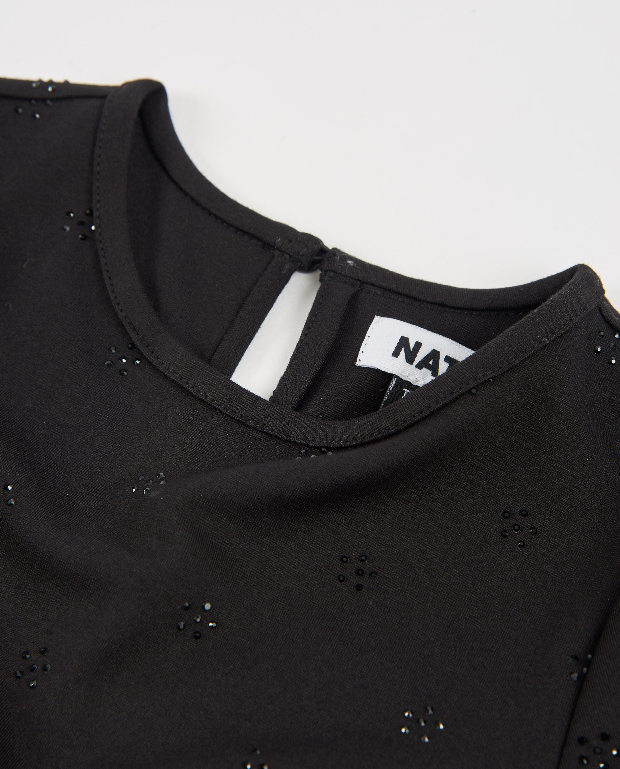 Vestido de niña de punto con volantes en el bajo y manga larga