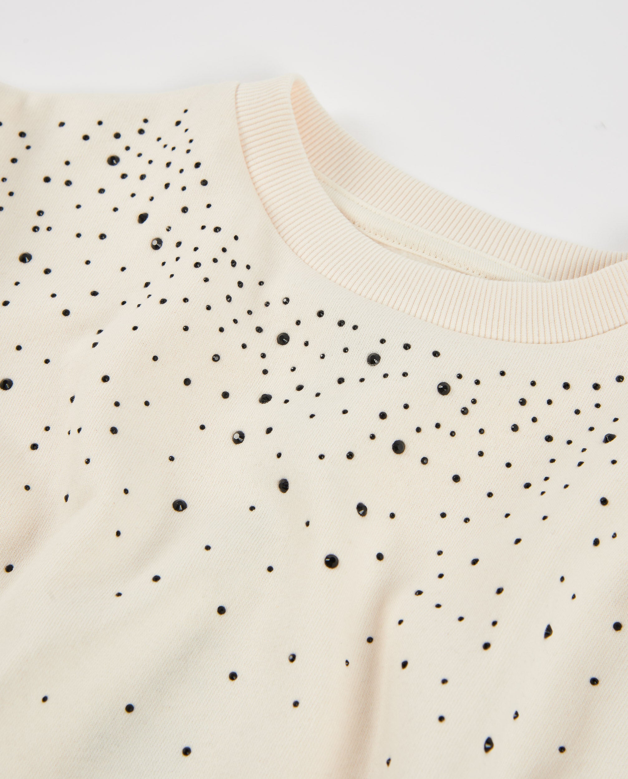 Sudadera de niña de felpa con pedrería y puños elásticos