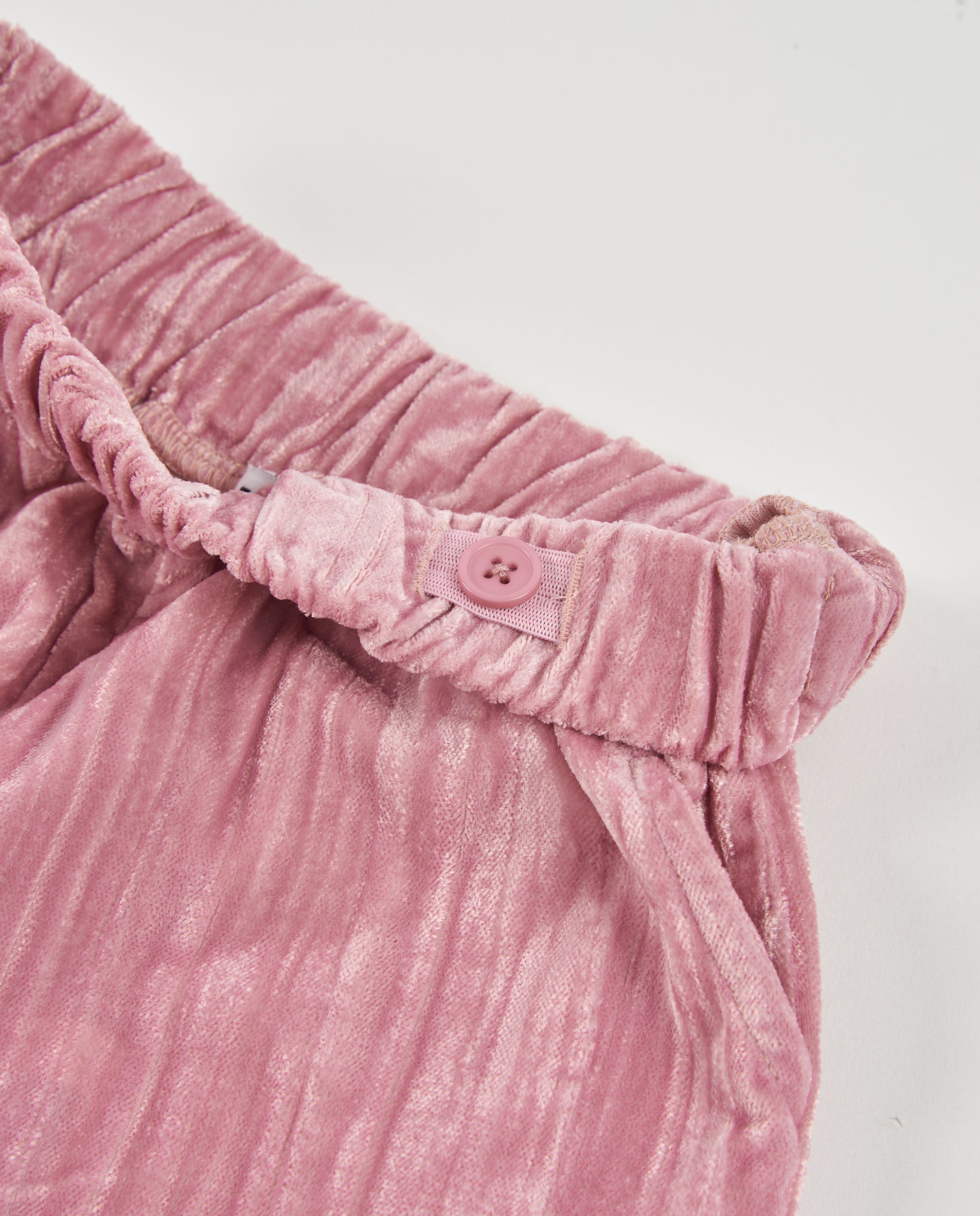 Pantalón de niña de tela plana con cintura elástica y perneras rectas