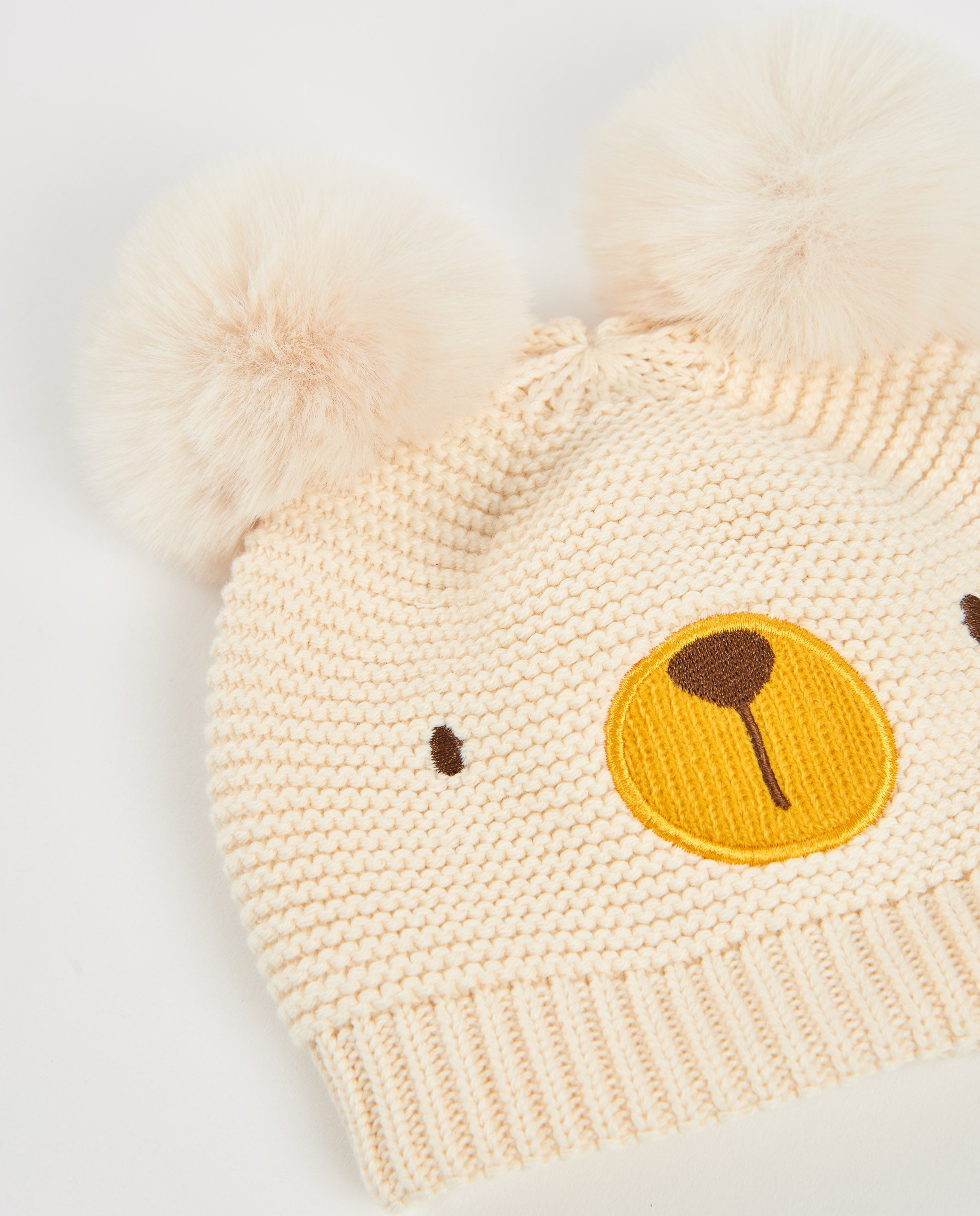 Gorro de bebé  en tricot con pompones