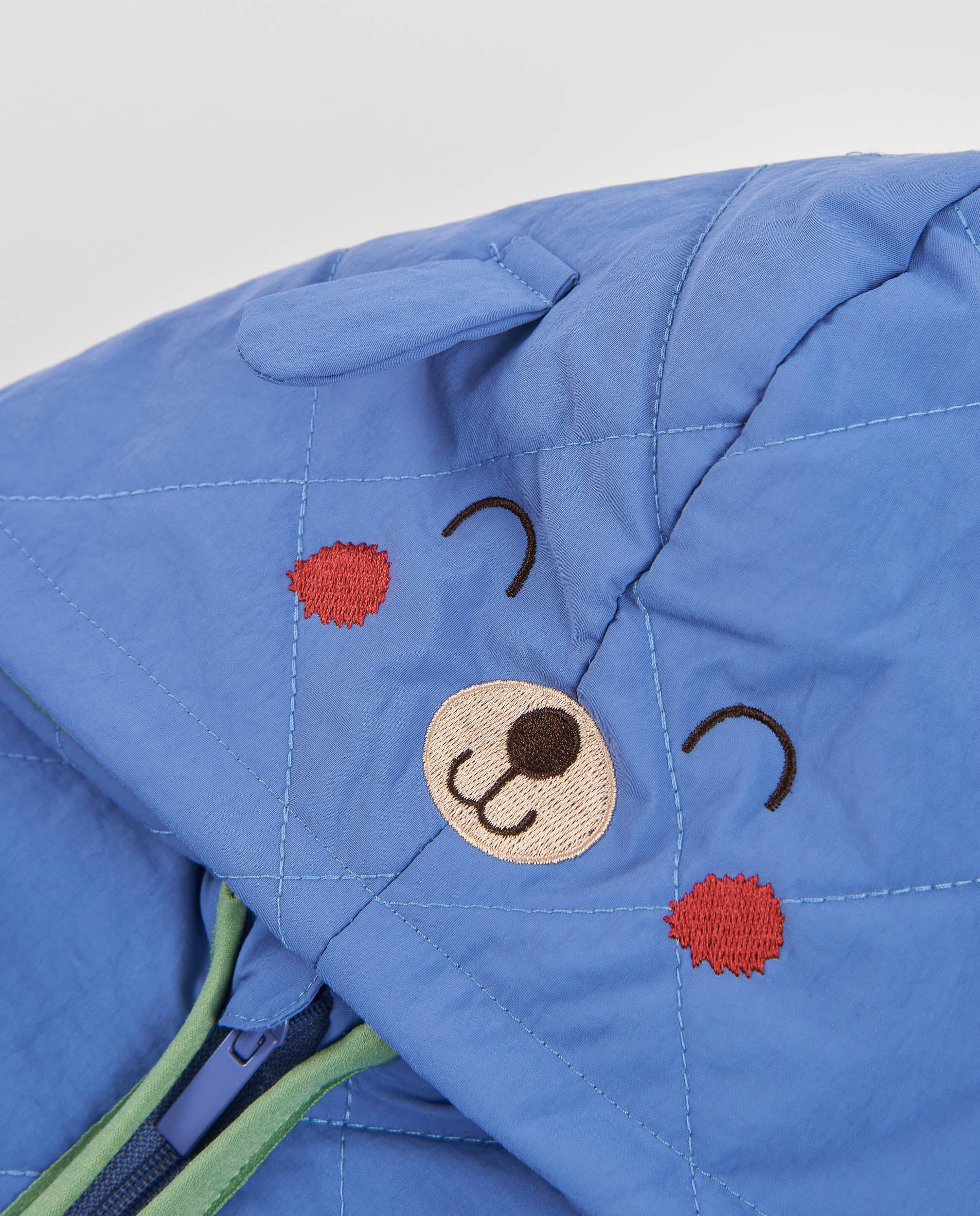 Chaqueta de tela plana de bebé con acolchado