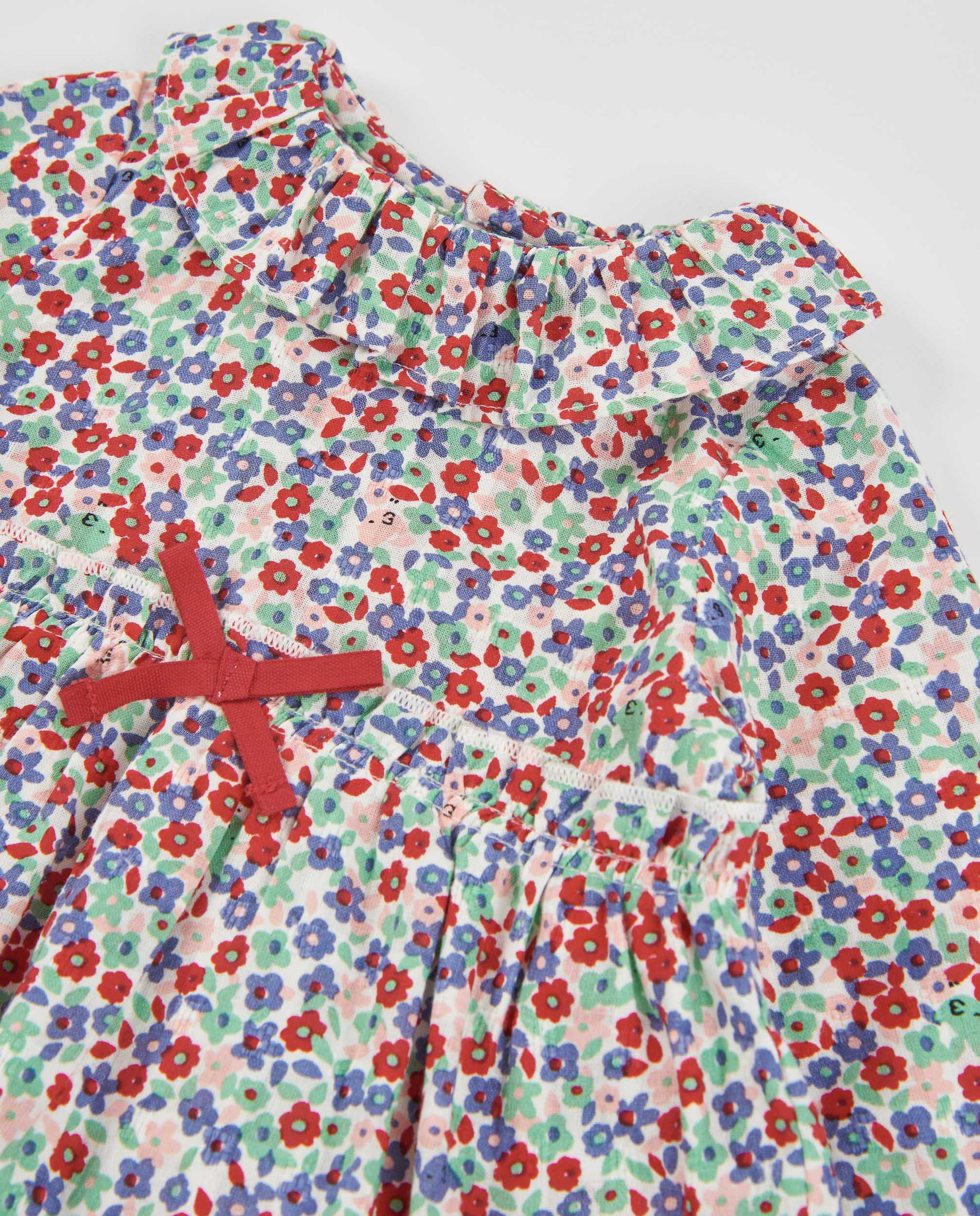 Vestido de tela plana de bebé con estampado floral