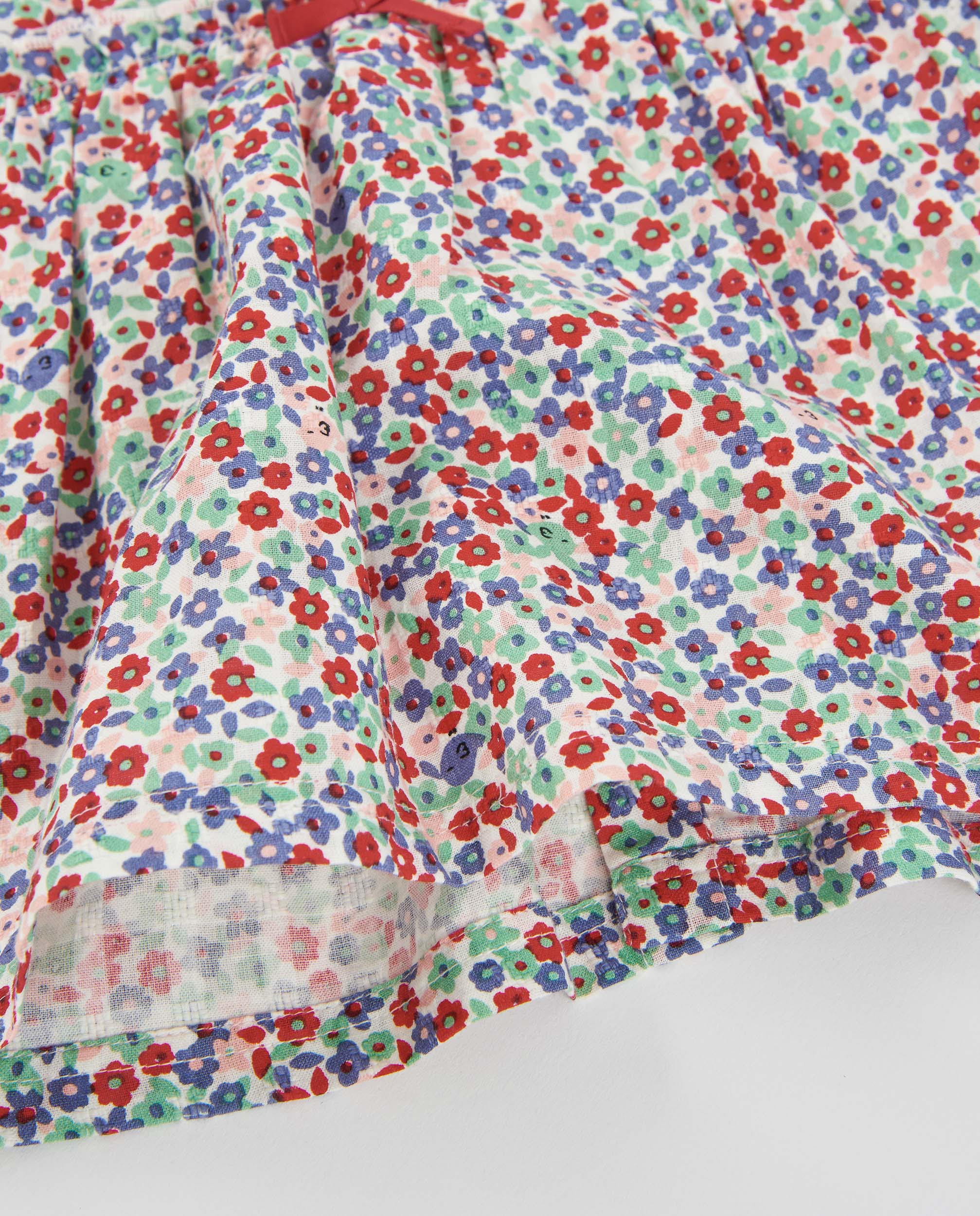 Vestido de tela plana de bebé con estampado floral
