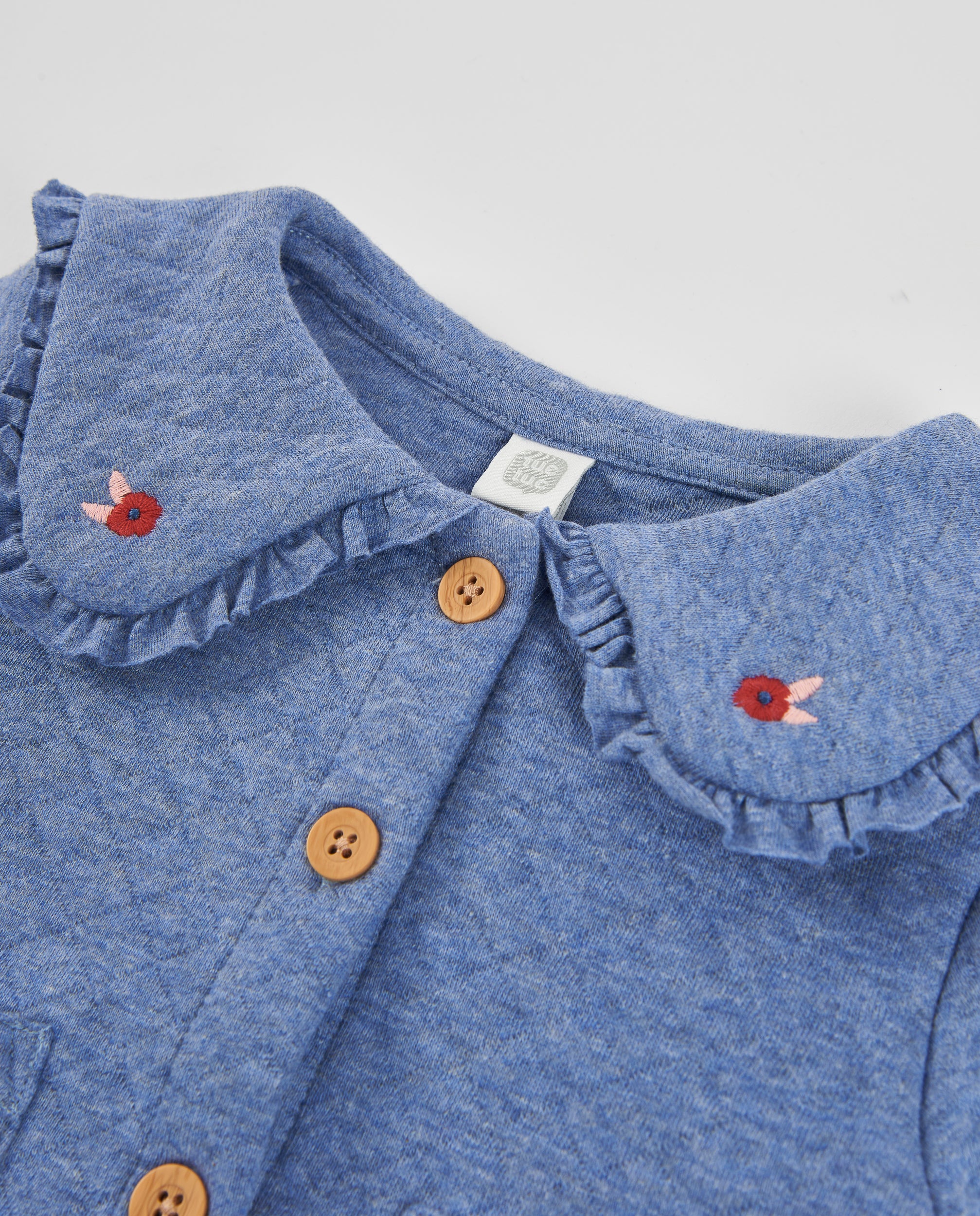 Chaqueta de punto de bebé con cuello de volante