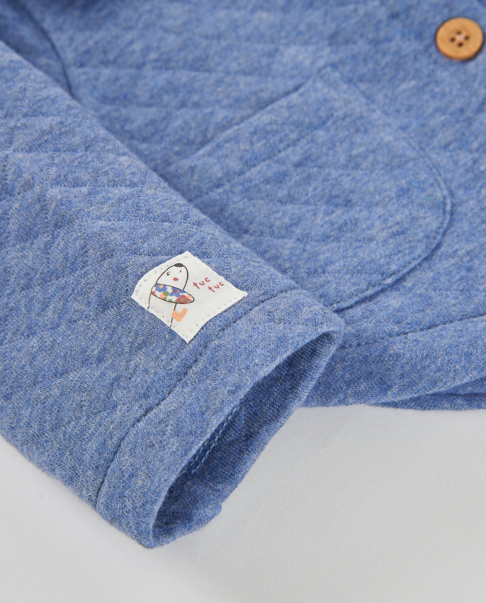 Chaqueta de punto de bebé con cuello de volante