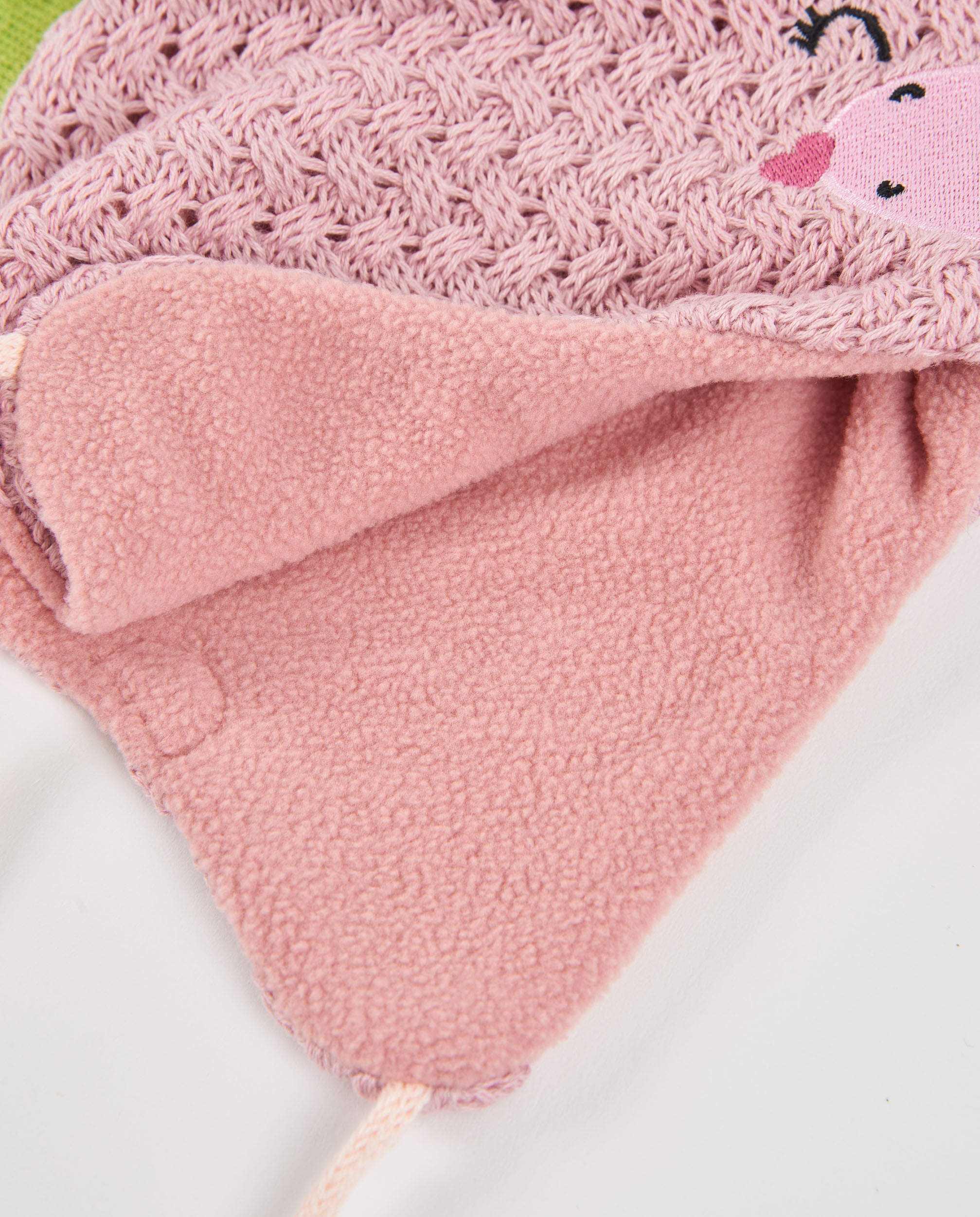 Gorro de bebé tricot con diseño de dinosaurio