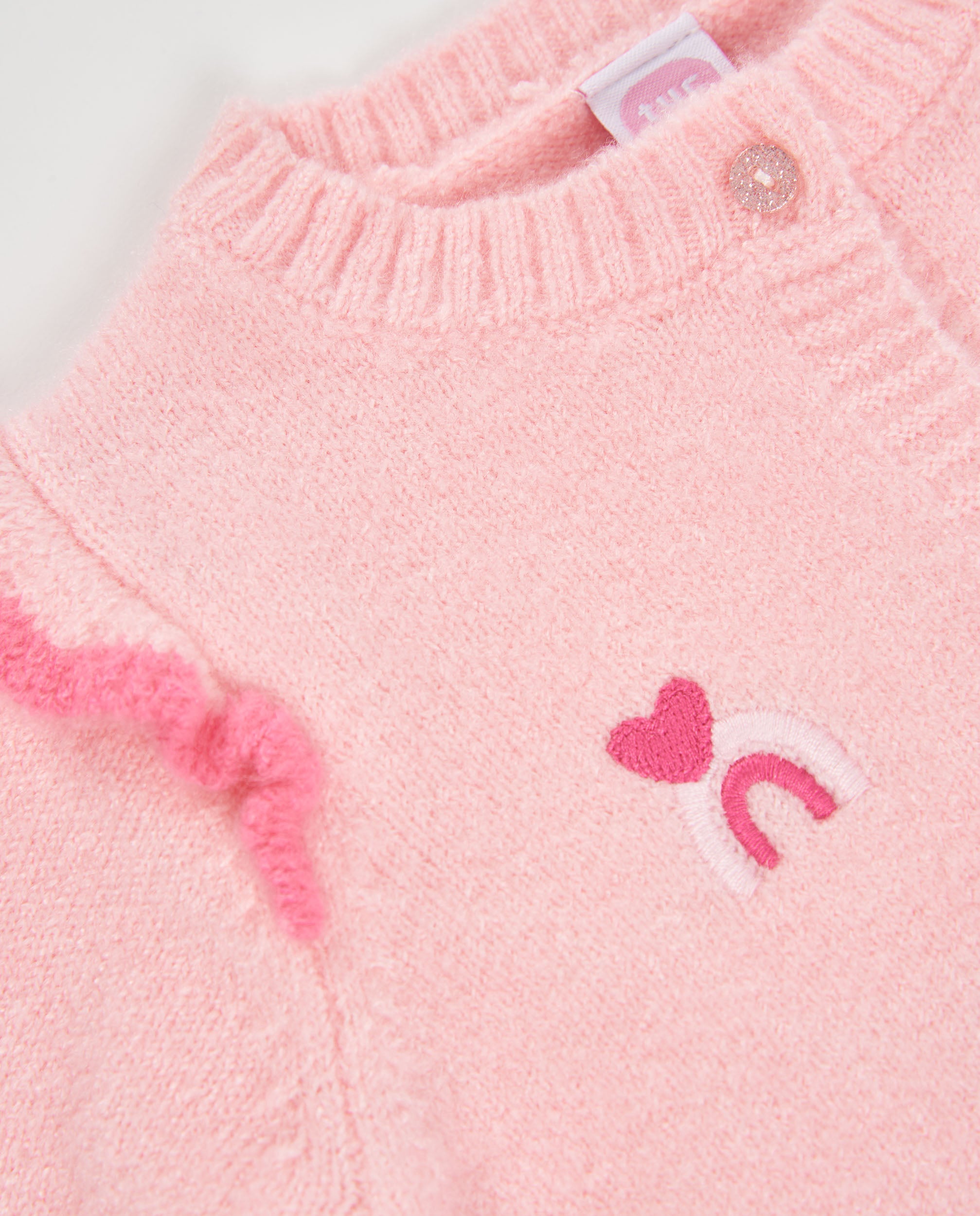 Chaqueta de tricot de bebé con volantes en los hombros