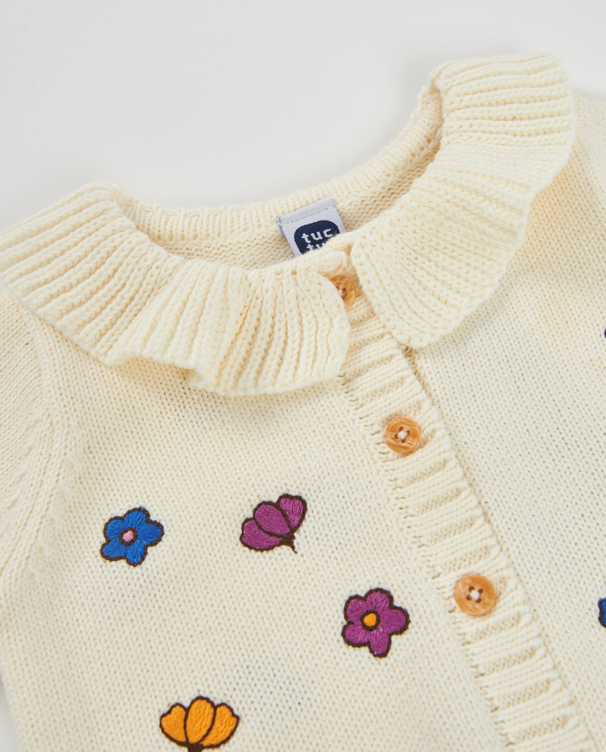 Chaqueta de tricot de bebé con estampado floral