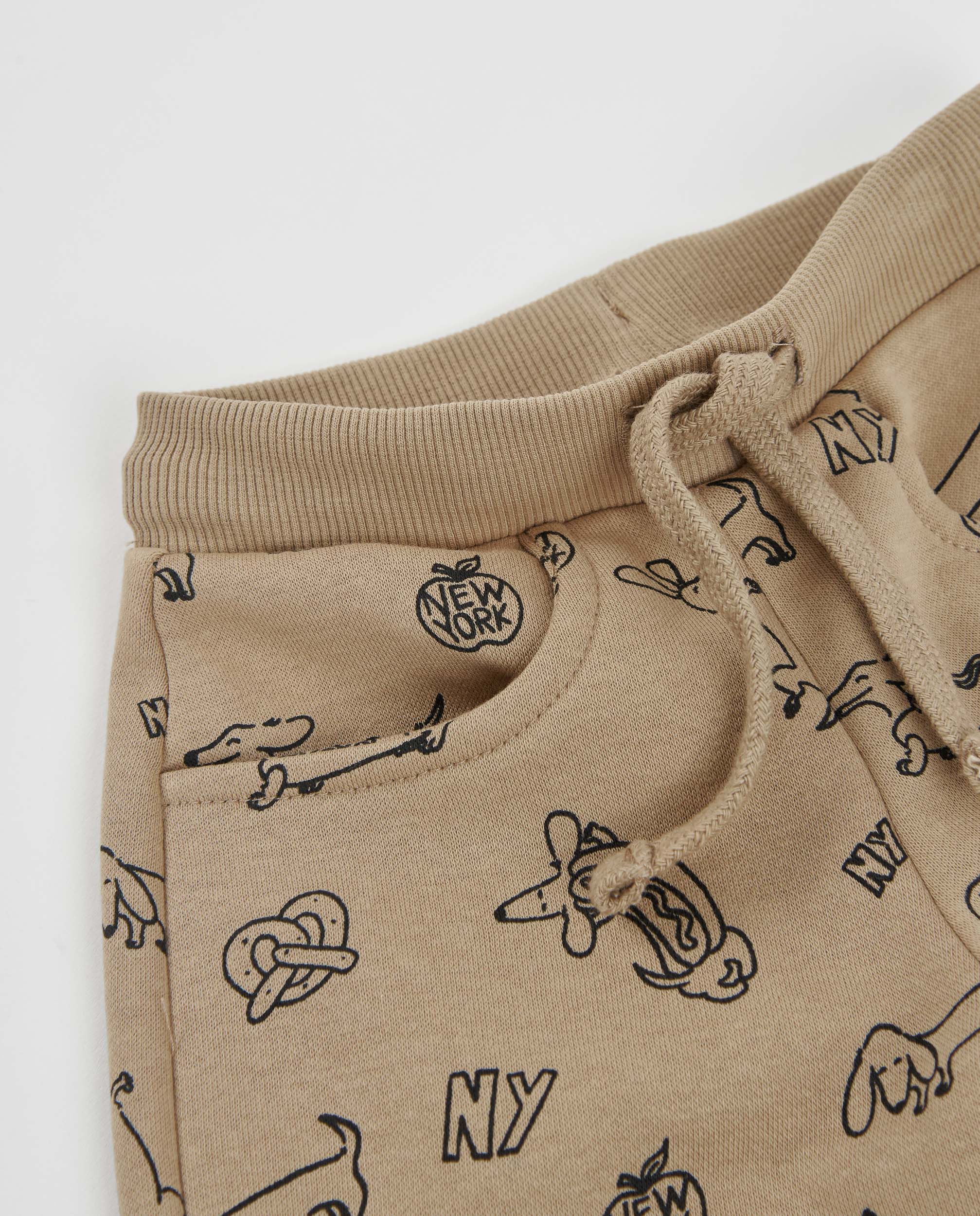 Pantalón de niño de felpa con estampado divertido y cordón
