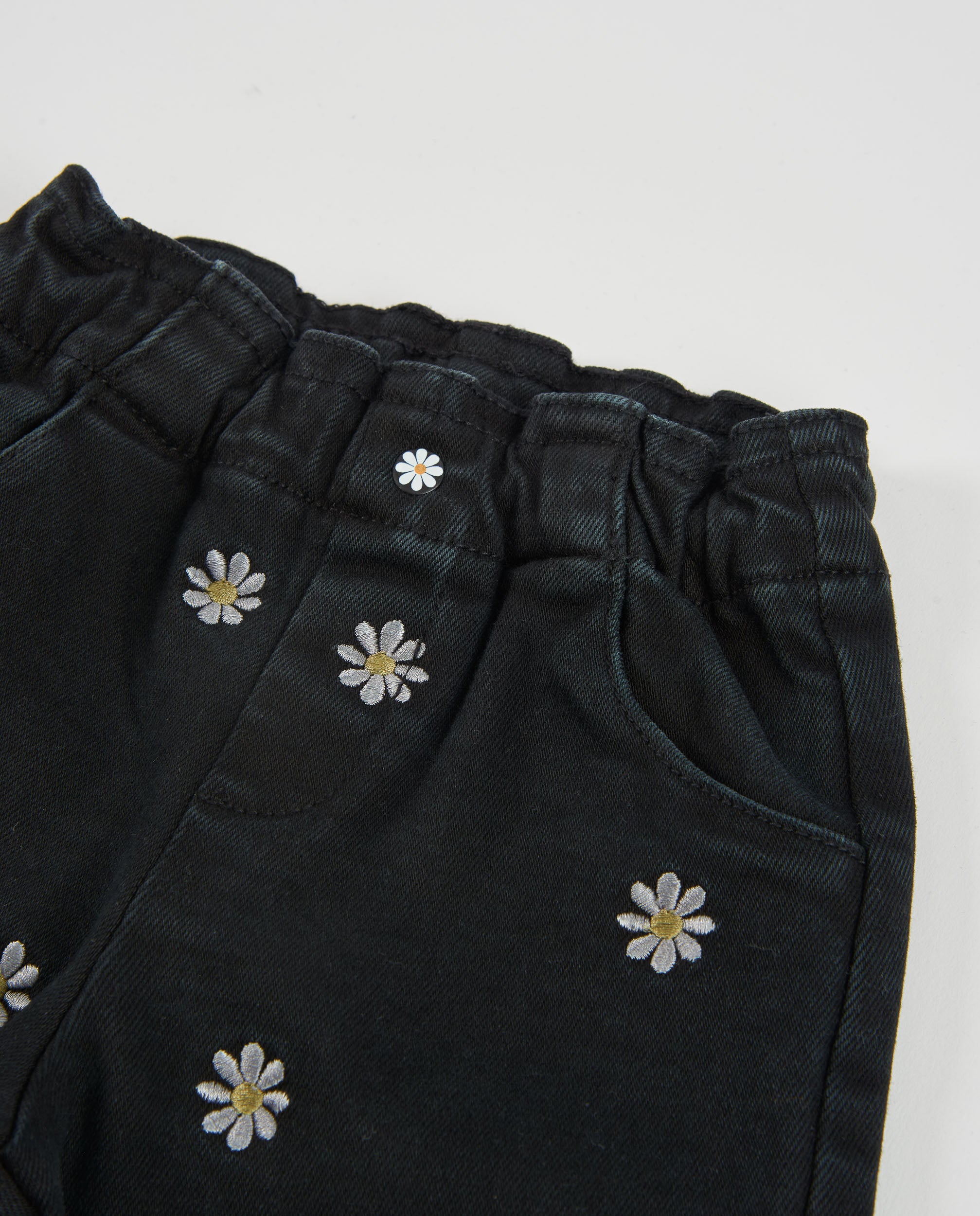 Pantalón de niña de tela plana con bordados florales