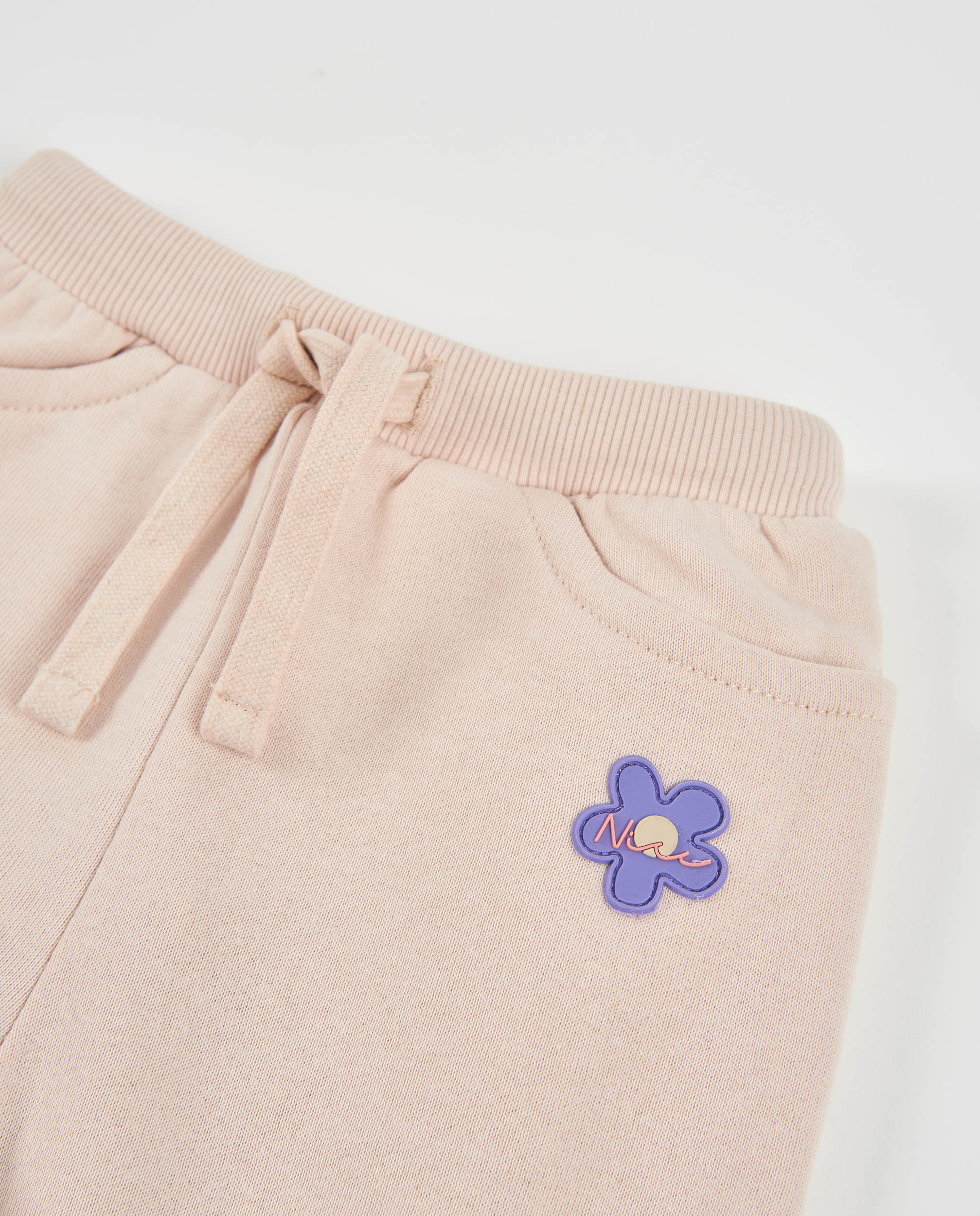 Pantalón de niña de felpa con bordado de flor y tacto suave
