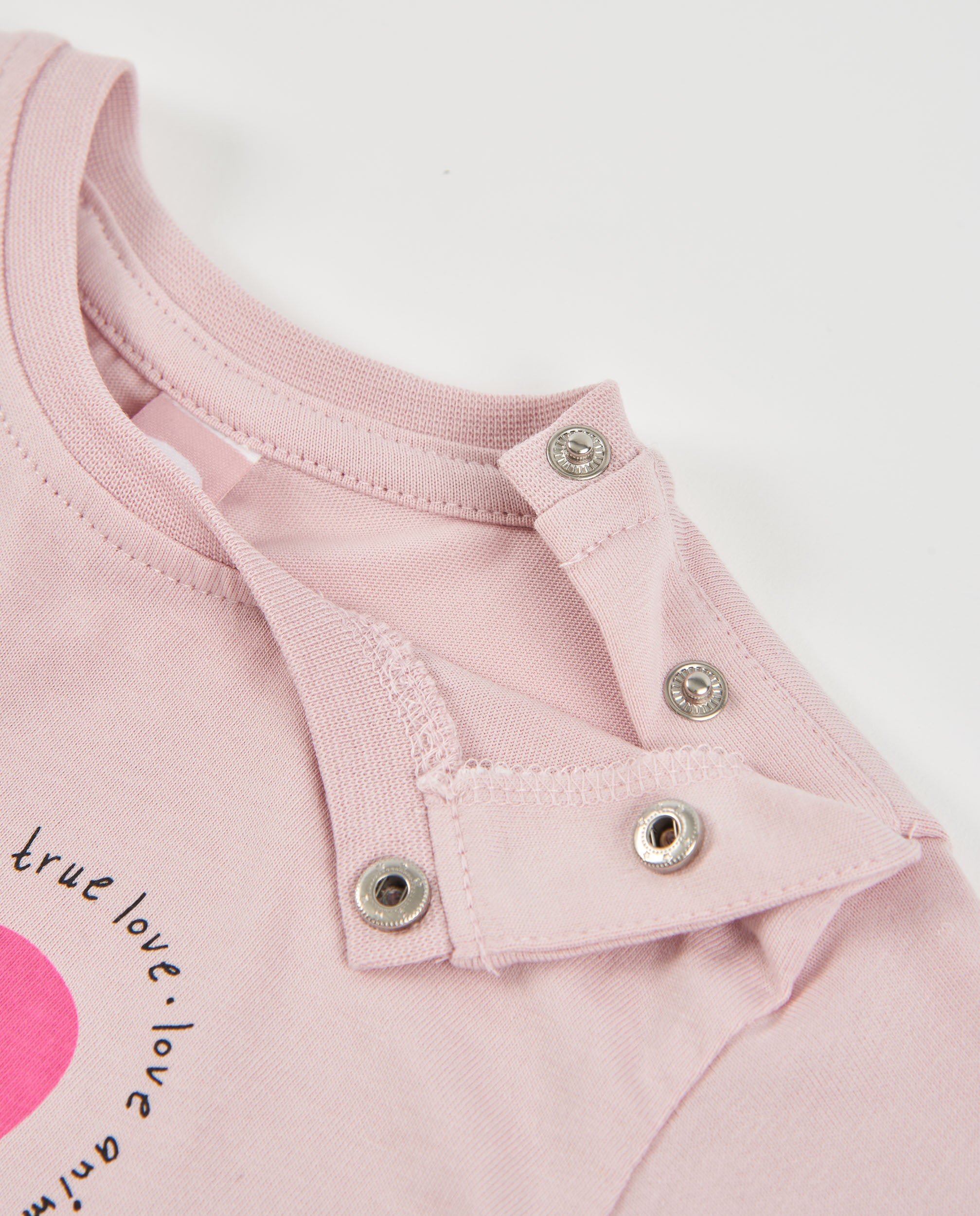 Camiseta de niña de punto con gráfico de corazón y manga larga