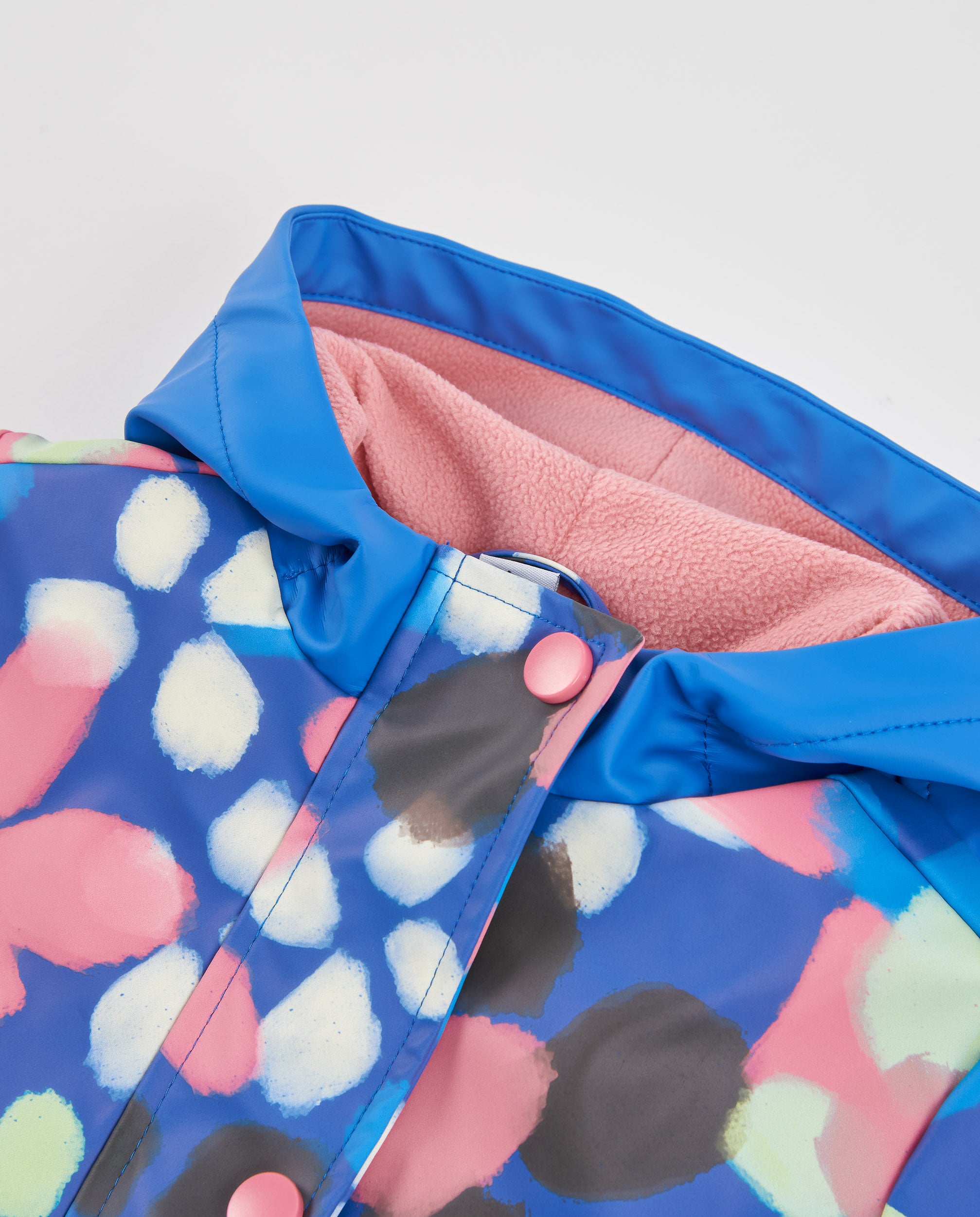 Chubasquero de niña con estampado floral y capucha divertida