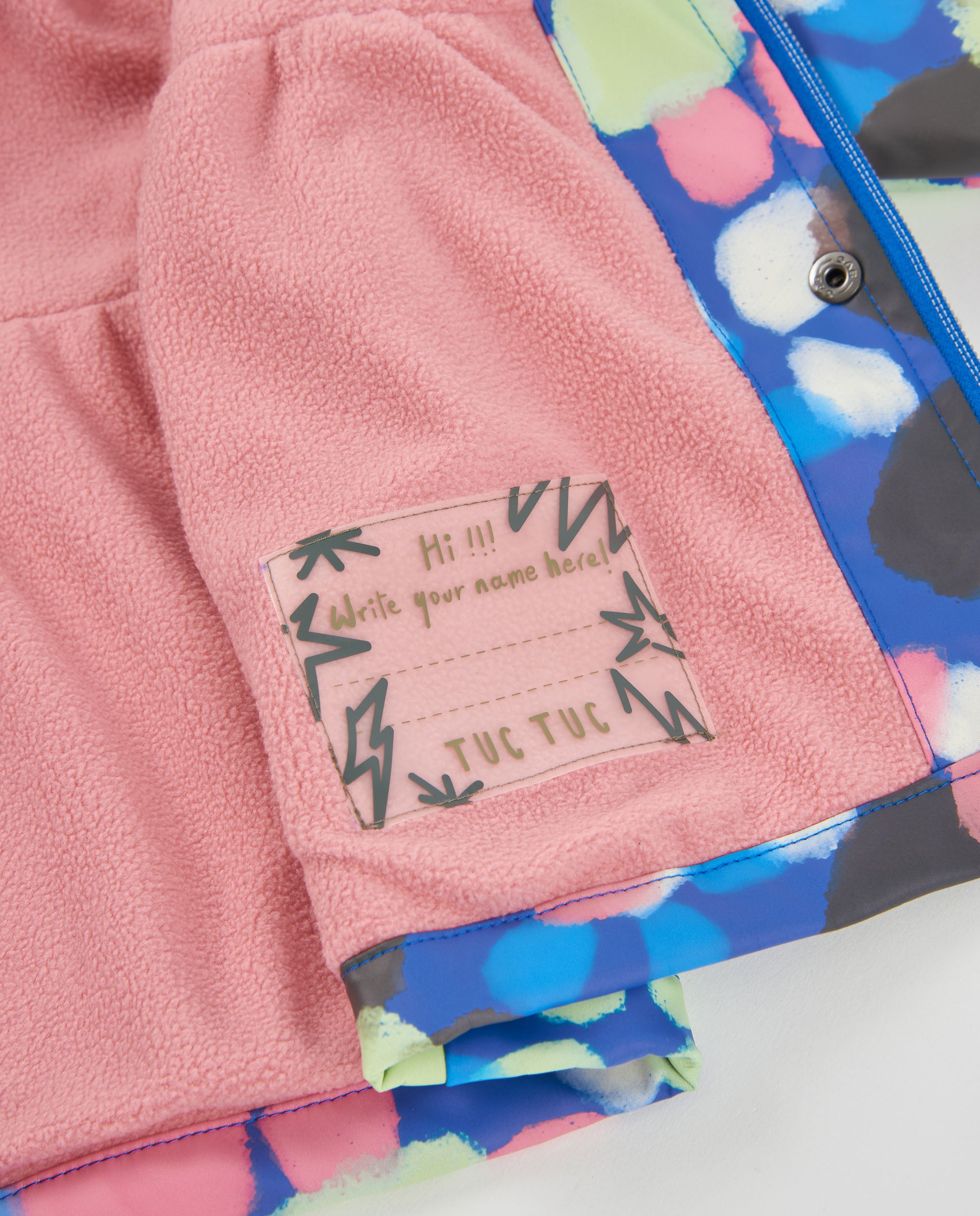 Chubasquero de niña con estampado floral y capucha divertida