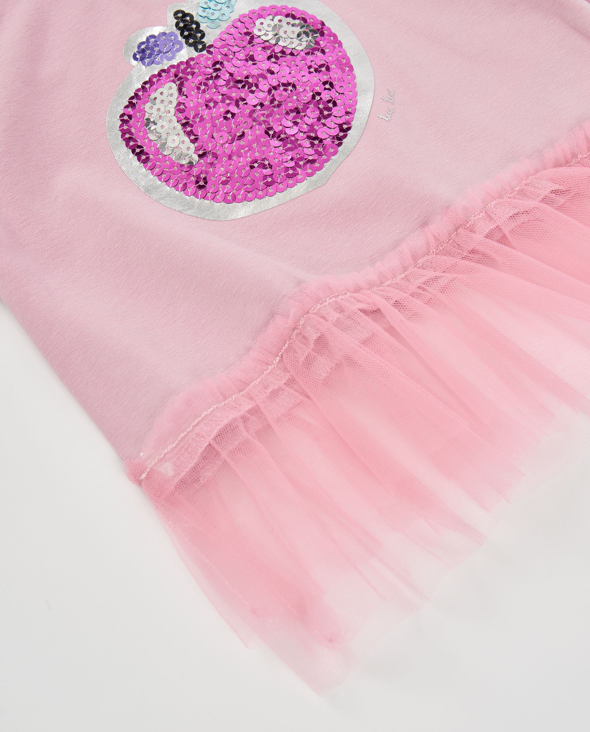 Camiseta de niña de punto con volantes y detalle de lentejuelas