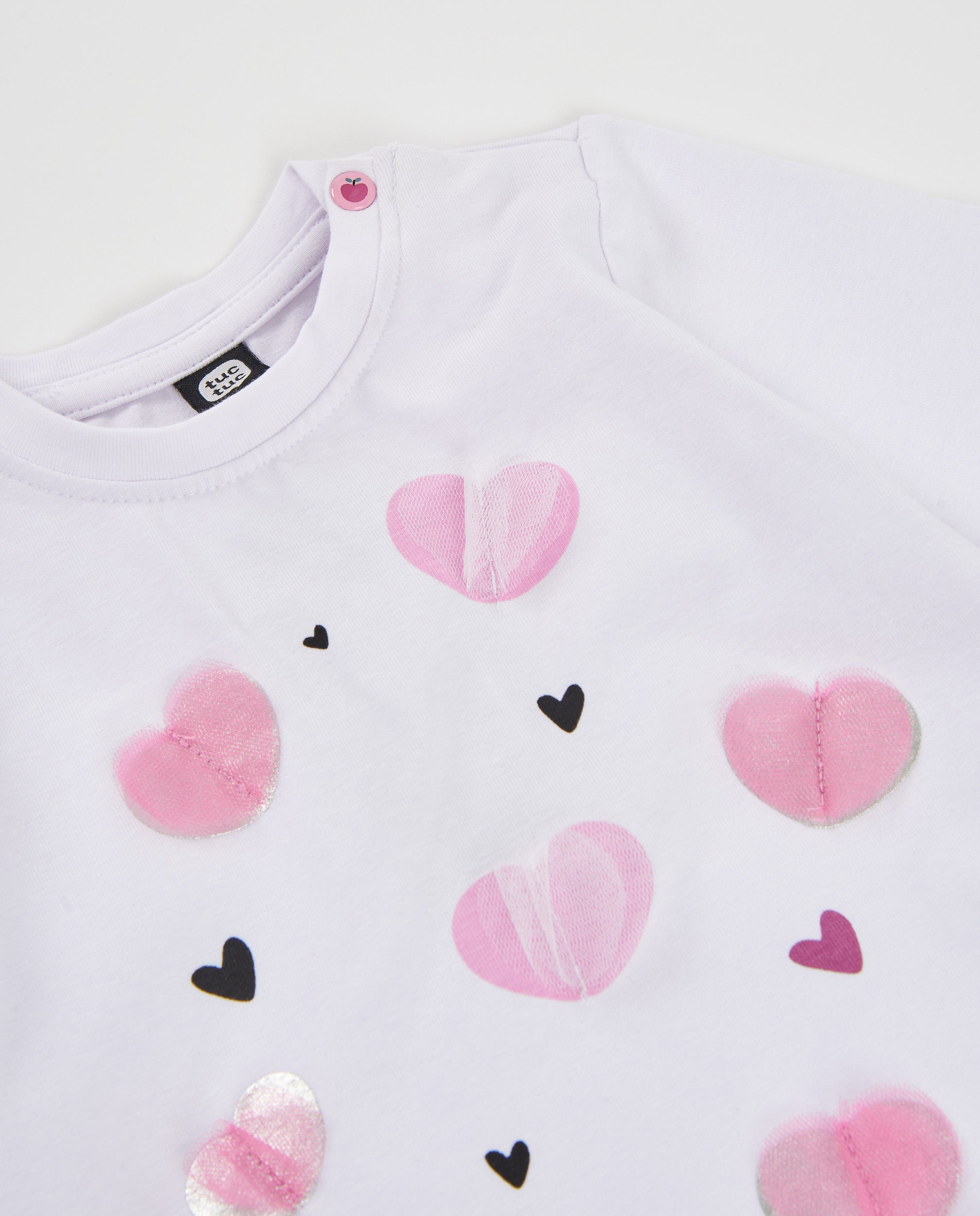 Camiseta de niña de punto con volante y estampado de corazones