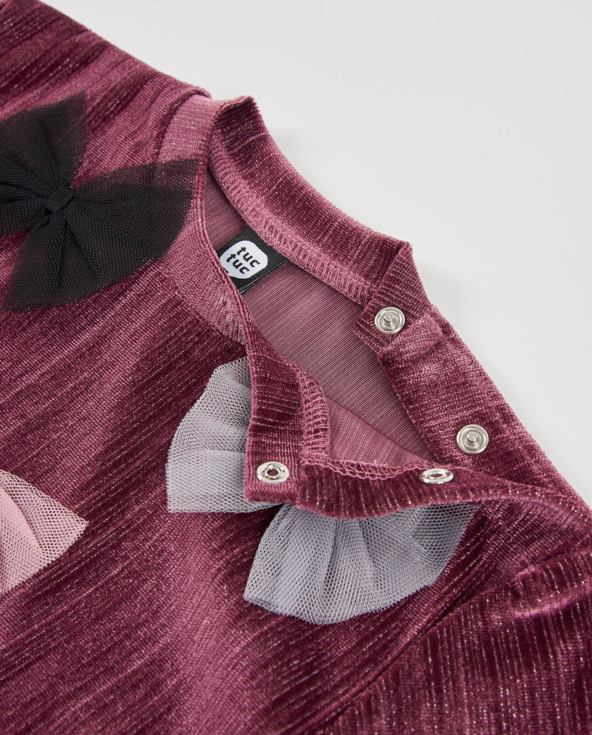 Sudadera de niña de terciopelo con lazos decorativos y tacto suave