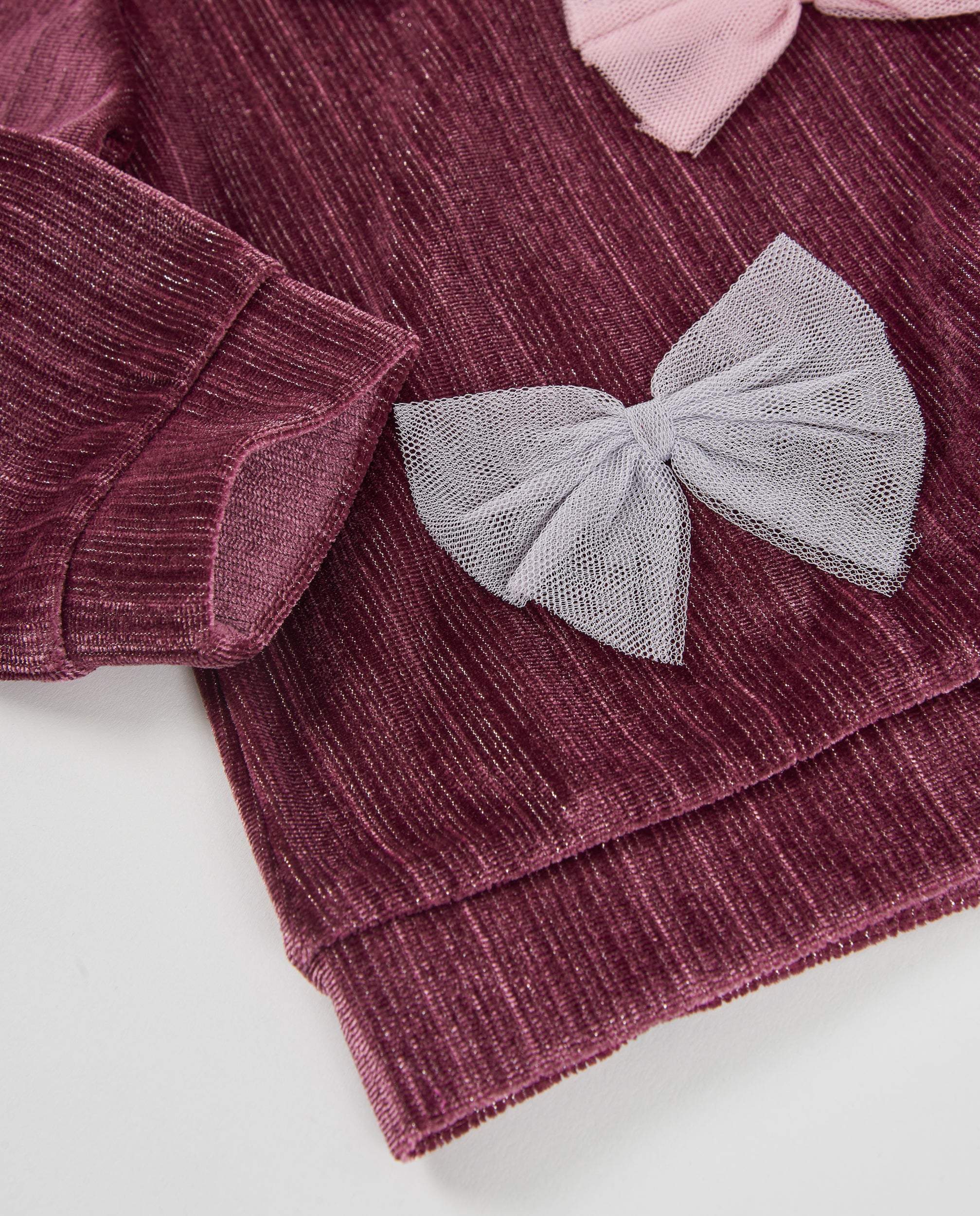 Sudadera de niña de terciopelo con lazos decorativos y tacto suave