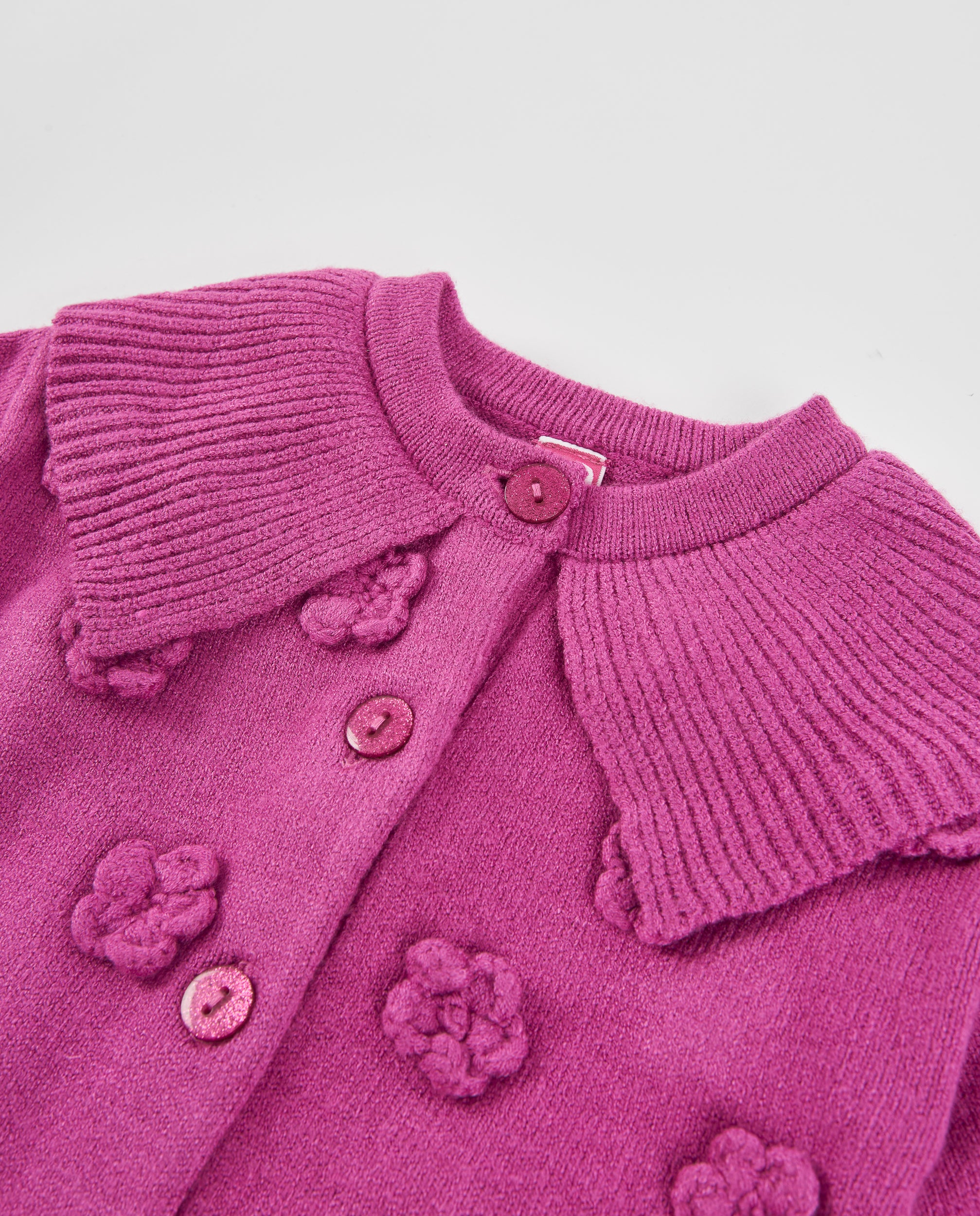 Chaqueta de niña de tricot con detalles florales y tacto suave