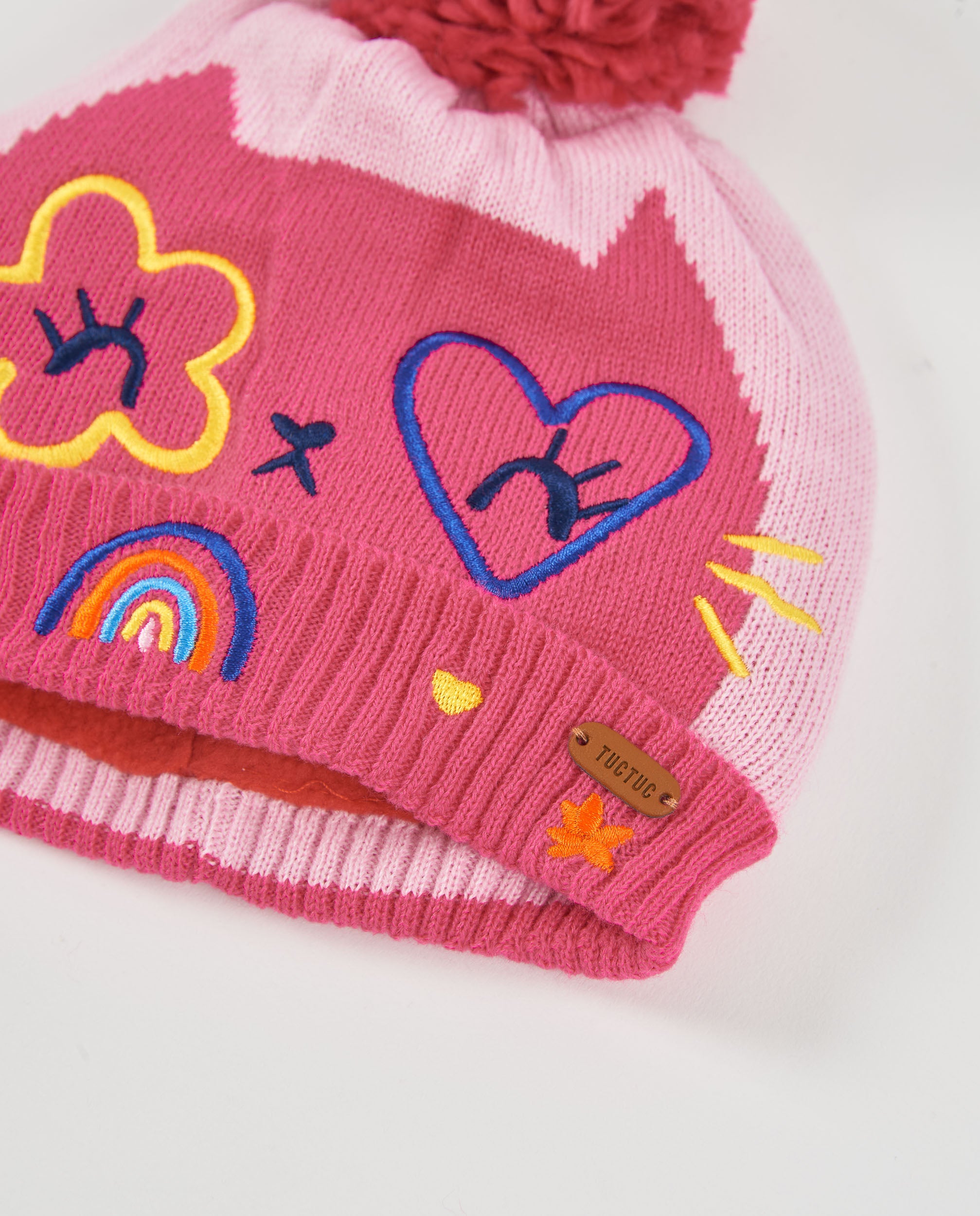 Set de niña de tricot con gorro de pompón y braga de cuello