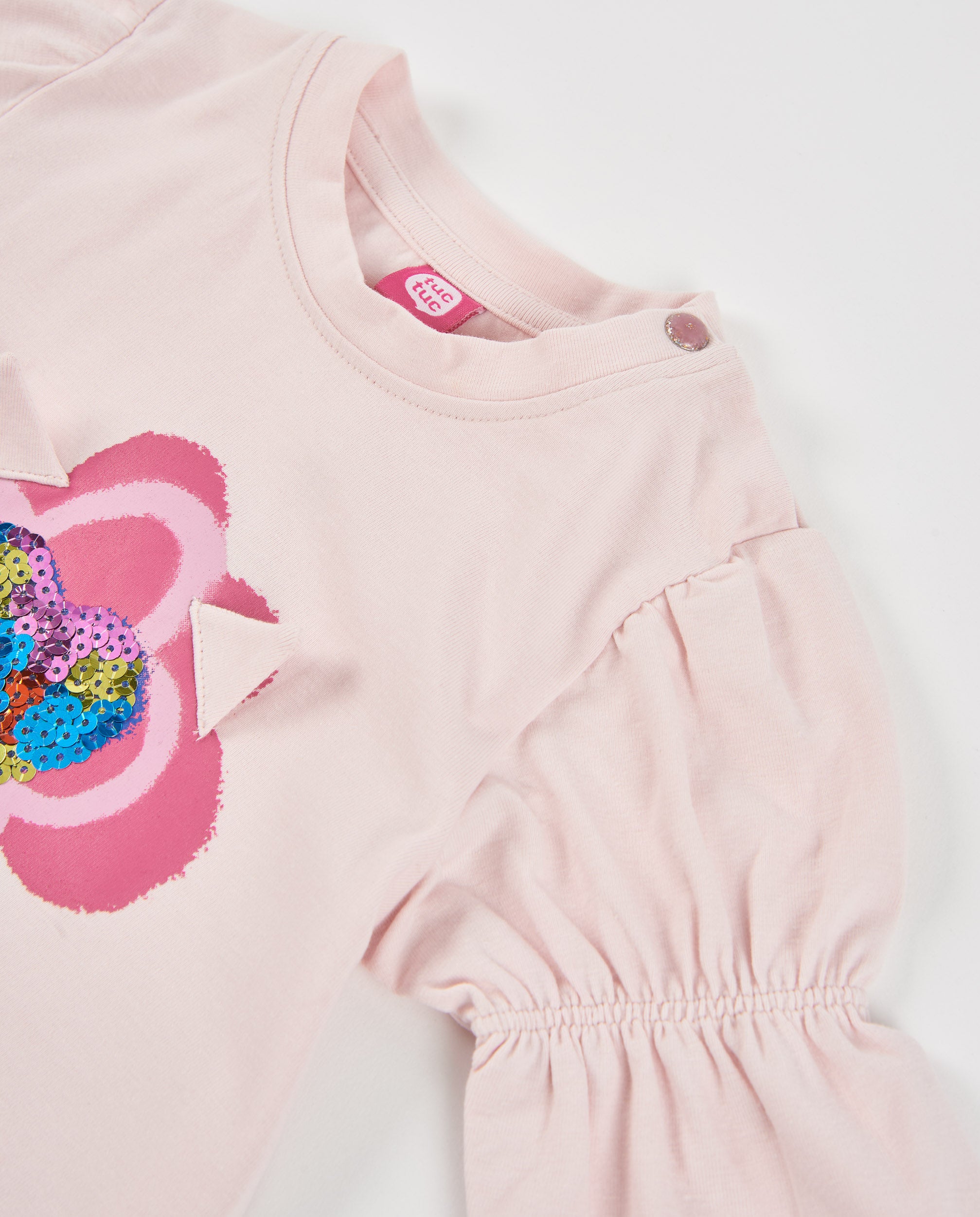 Camiseta de niña de punto con diseño de corazón y lentejuelas