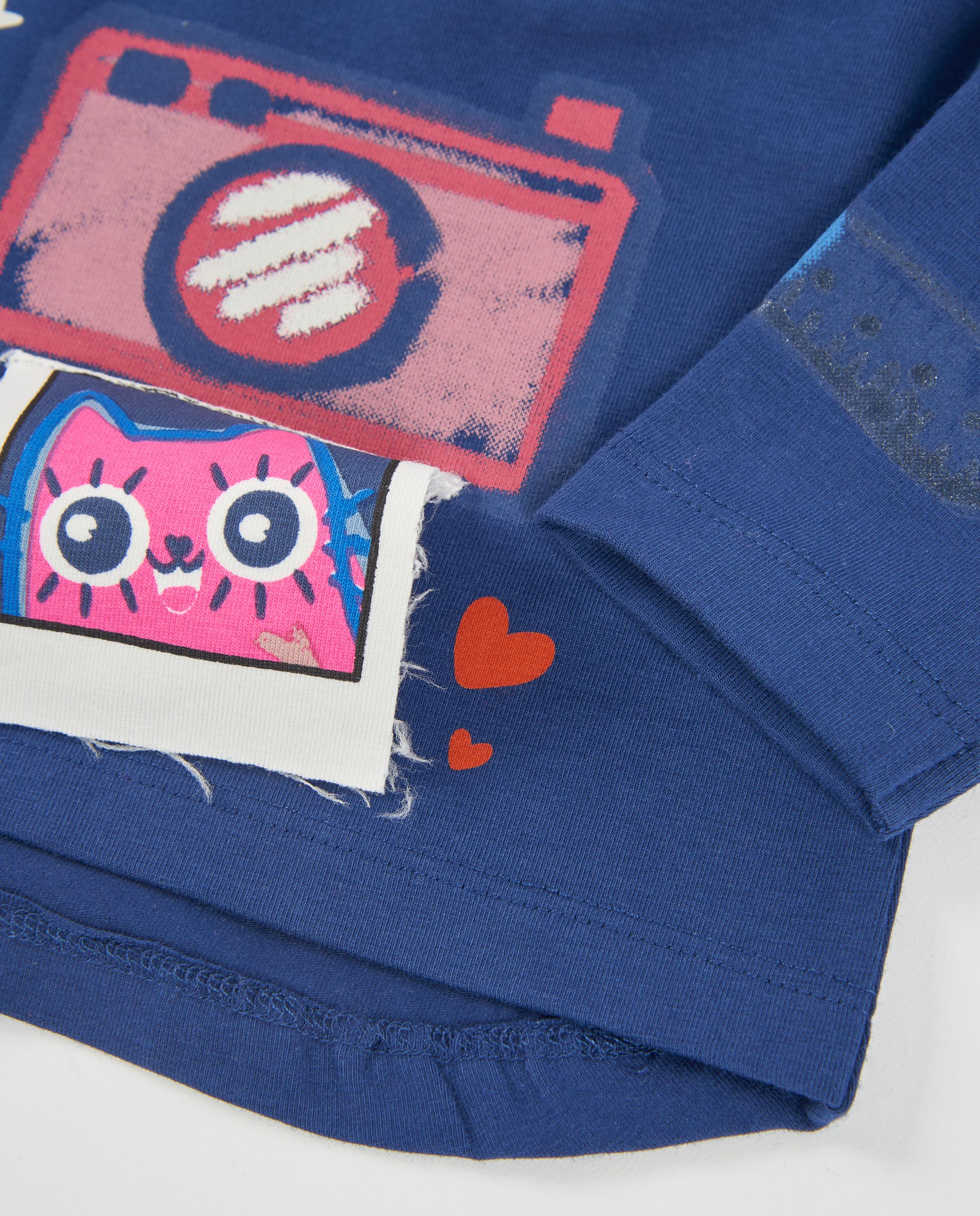 Camiseta de niña de punto con estampado frontal y volantes en hombros