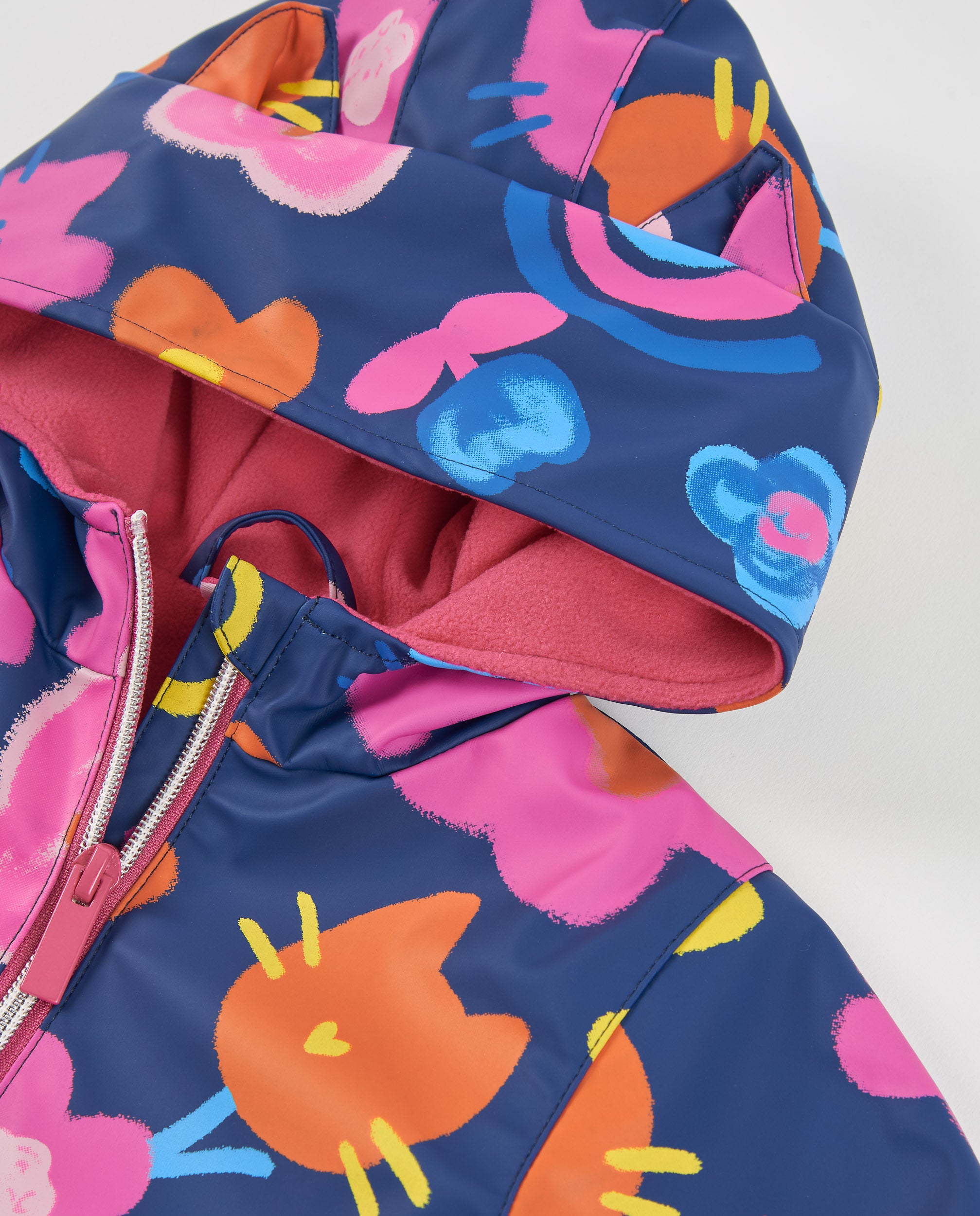 Chubasquero de niña con estampado floral y cierre de cremallera