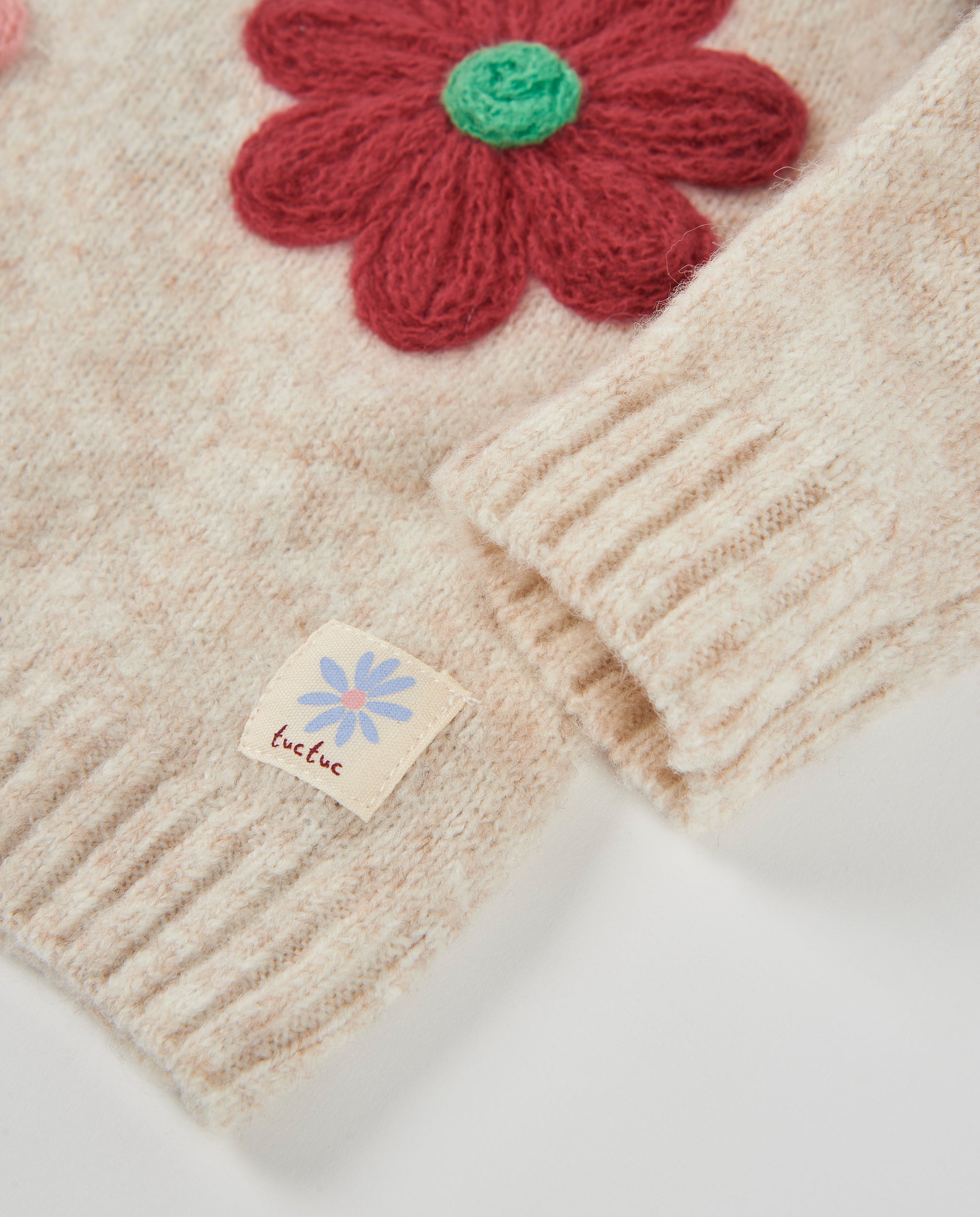 Jersey de niña de tricot con flores bordadas y tejido suave