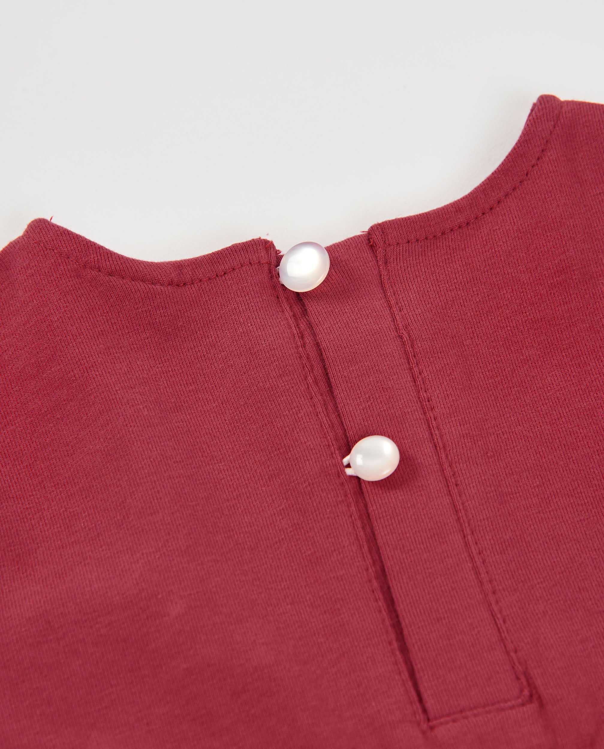 Camiseta de niña de punto con estampado floral y detalle fruncido