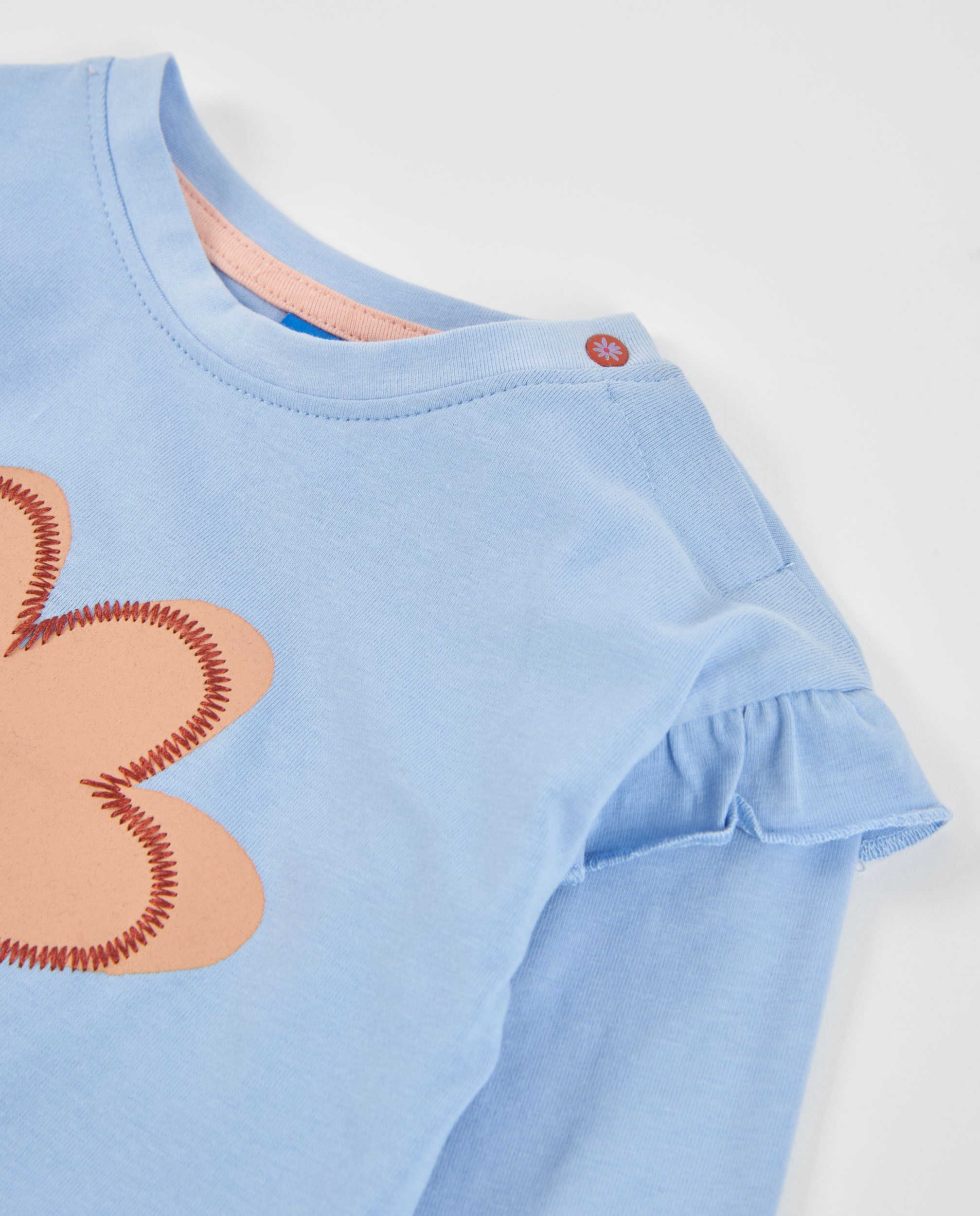 Camiseta de niña de punto con estampado floral central