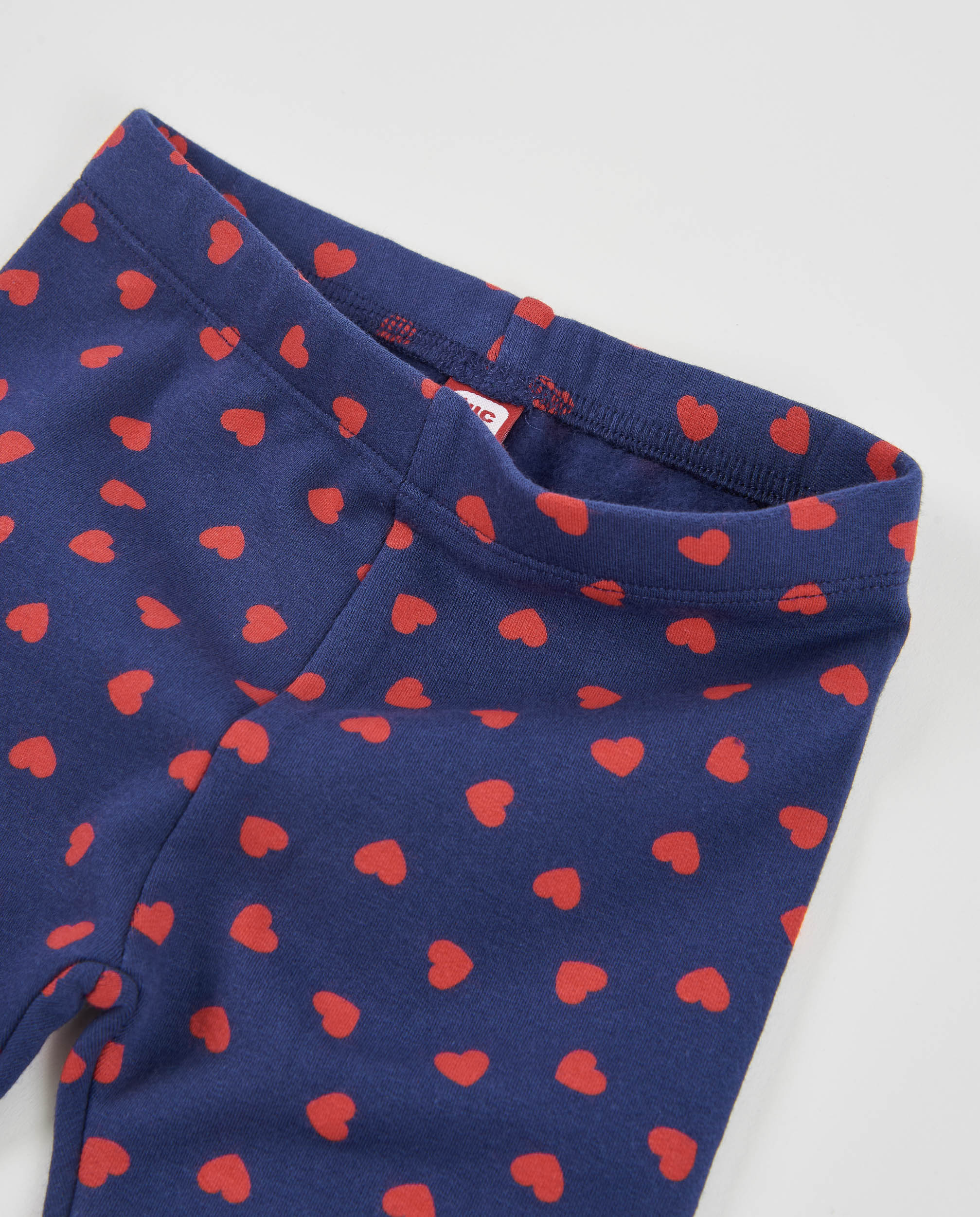 Legging de niña de felpa con estampado de corazones y tejido elástico