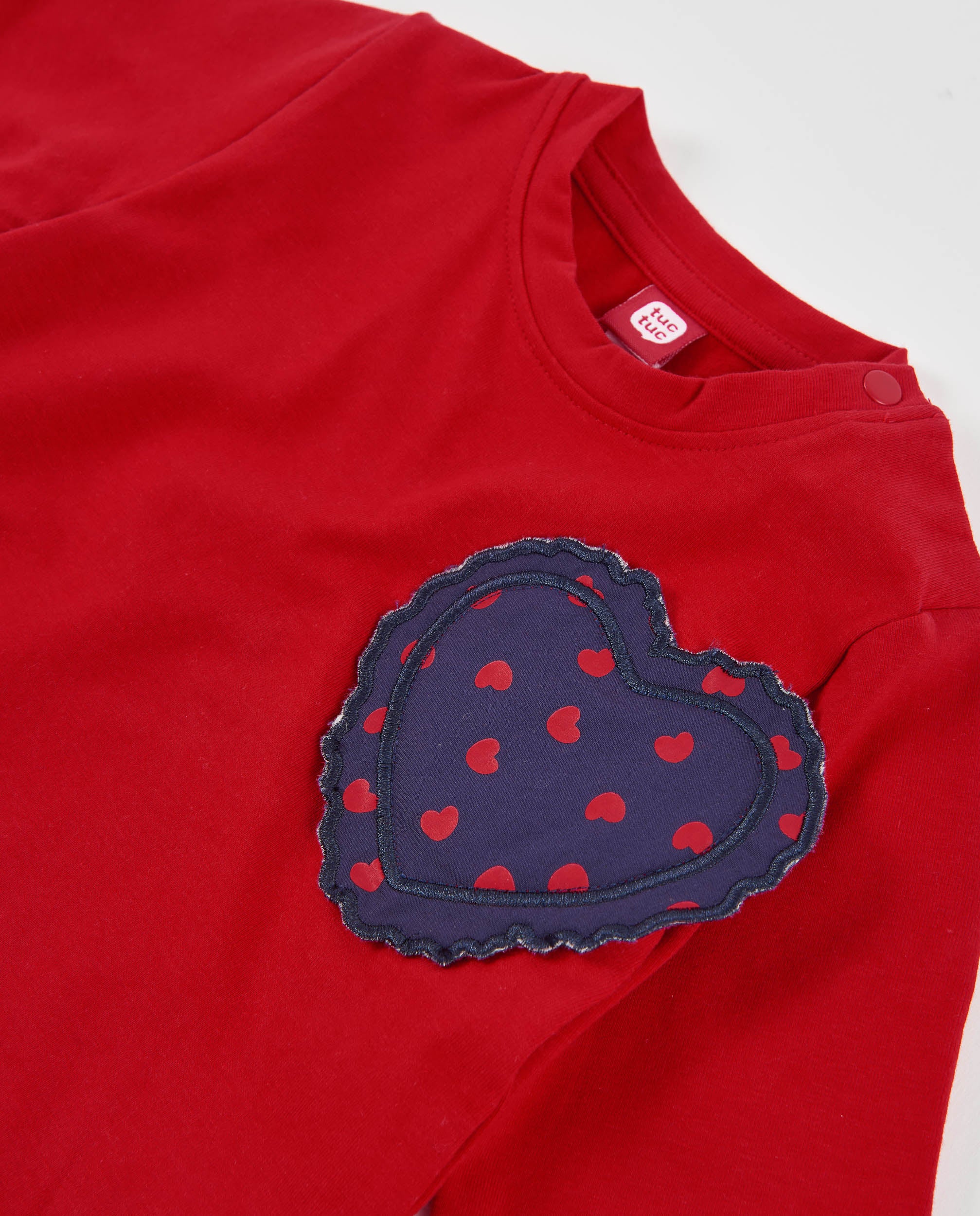 Camiseta de niña de punto con parche de corazón y manga larga