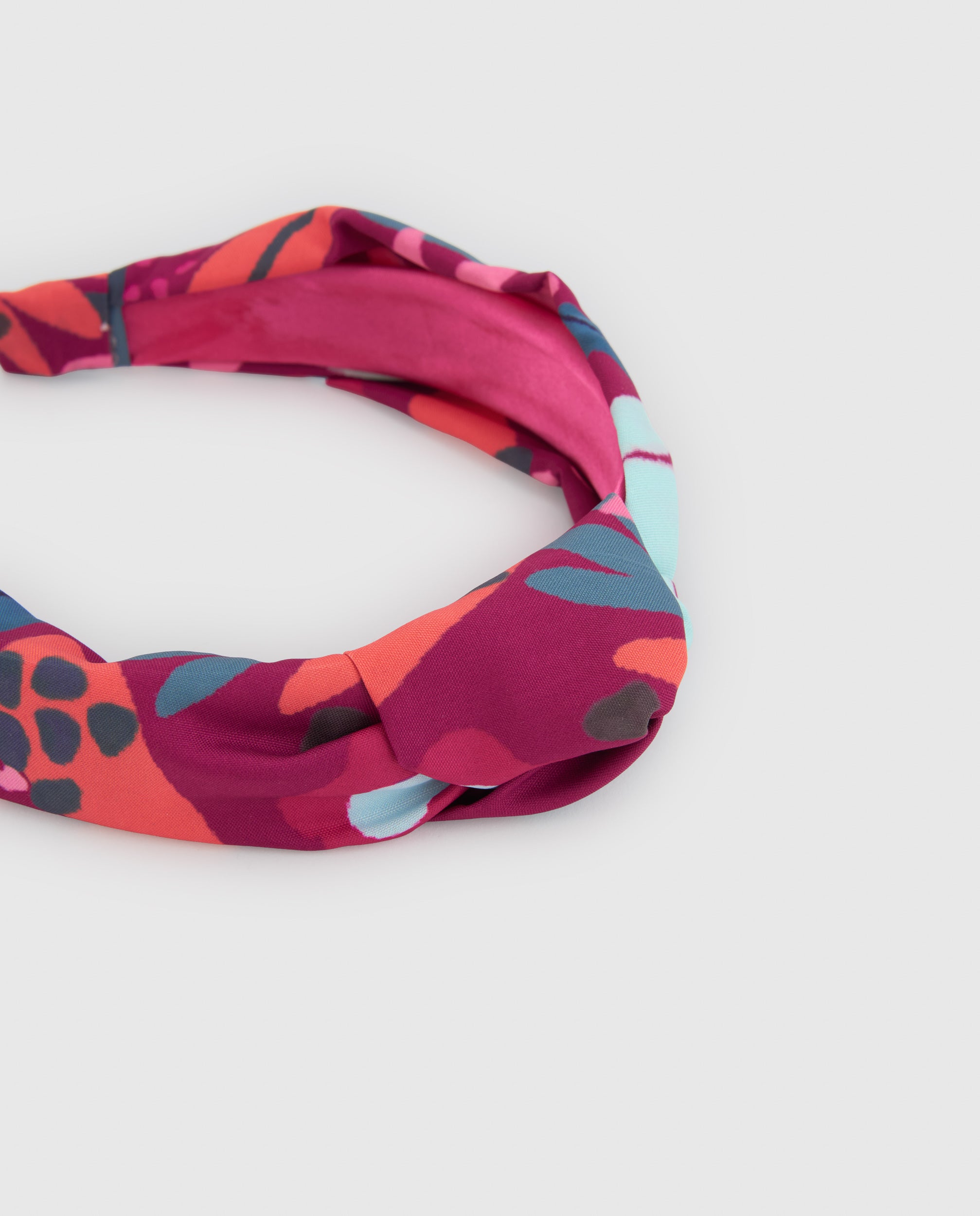 Diadema de niña rígida con estampado floral y colores vivos