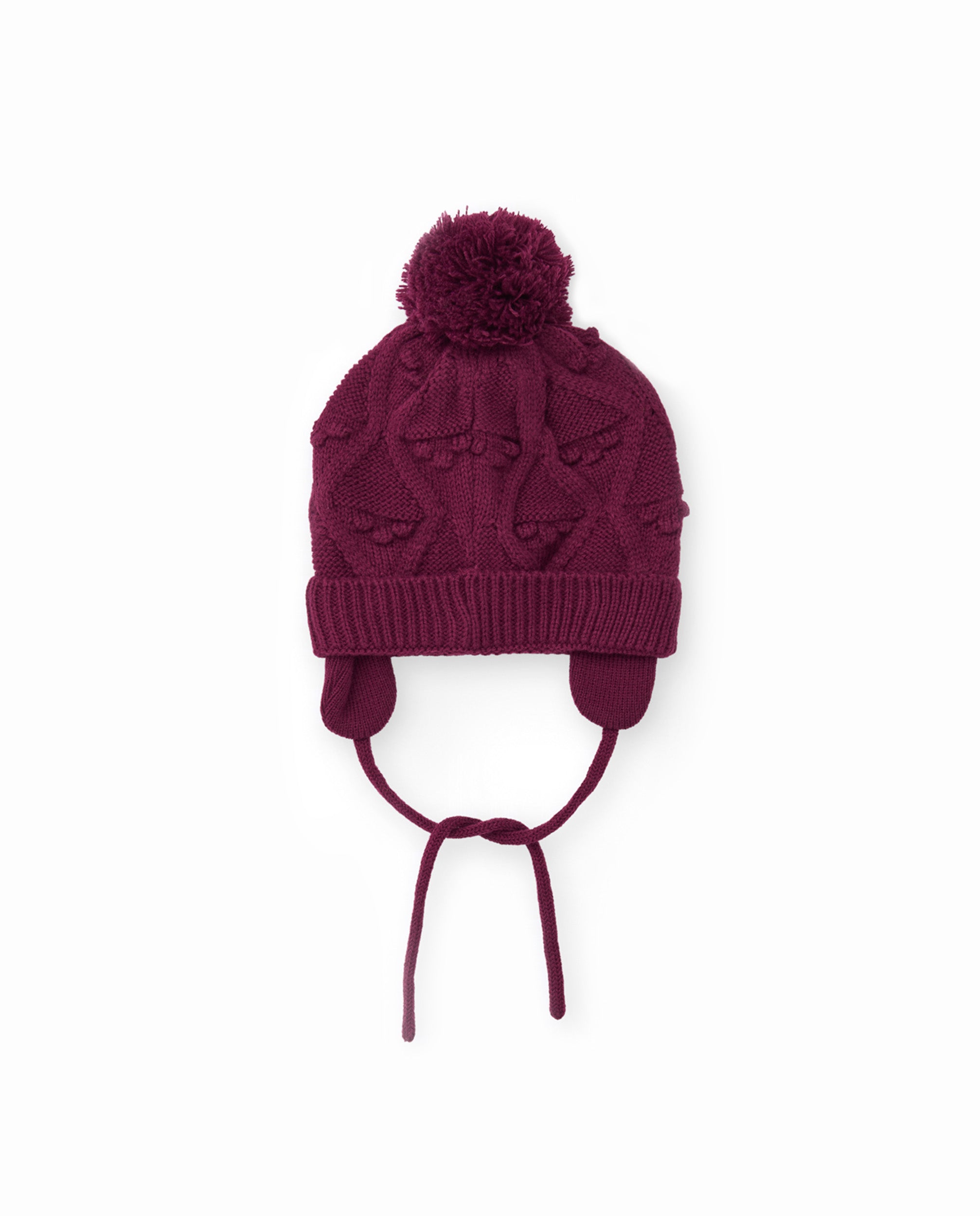 Gorro de niña de tricot con pompón y orejeras