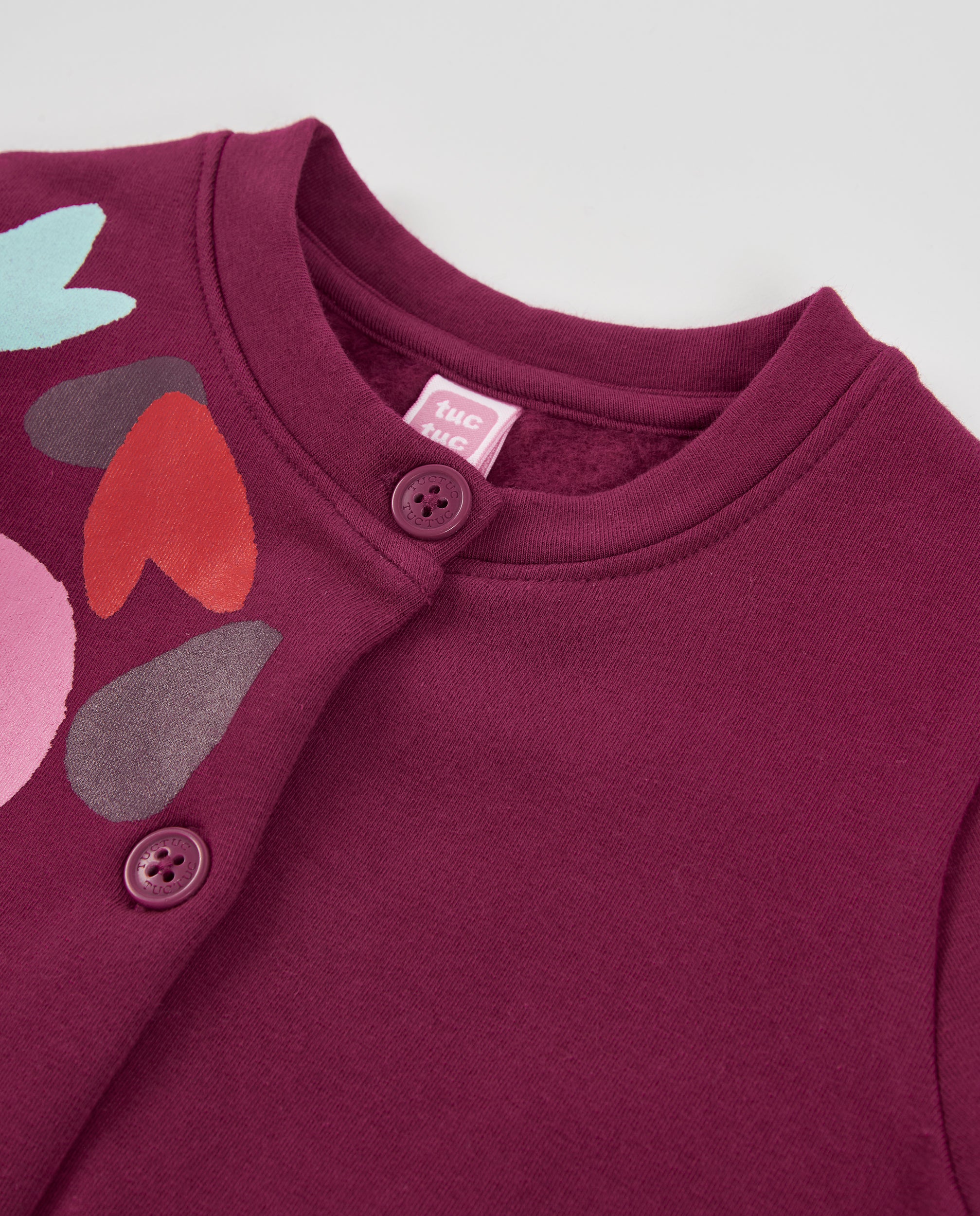 Chaqueta de niña de felpa con botones y detalles decorativos