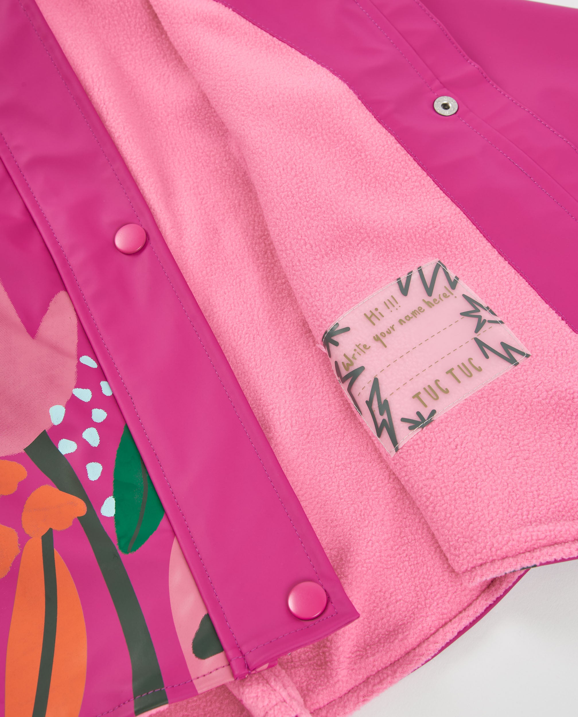 Chubasquero de niña con estampado floral y acabado resistente