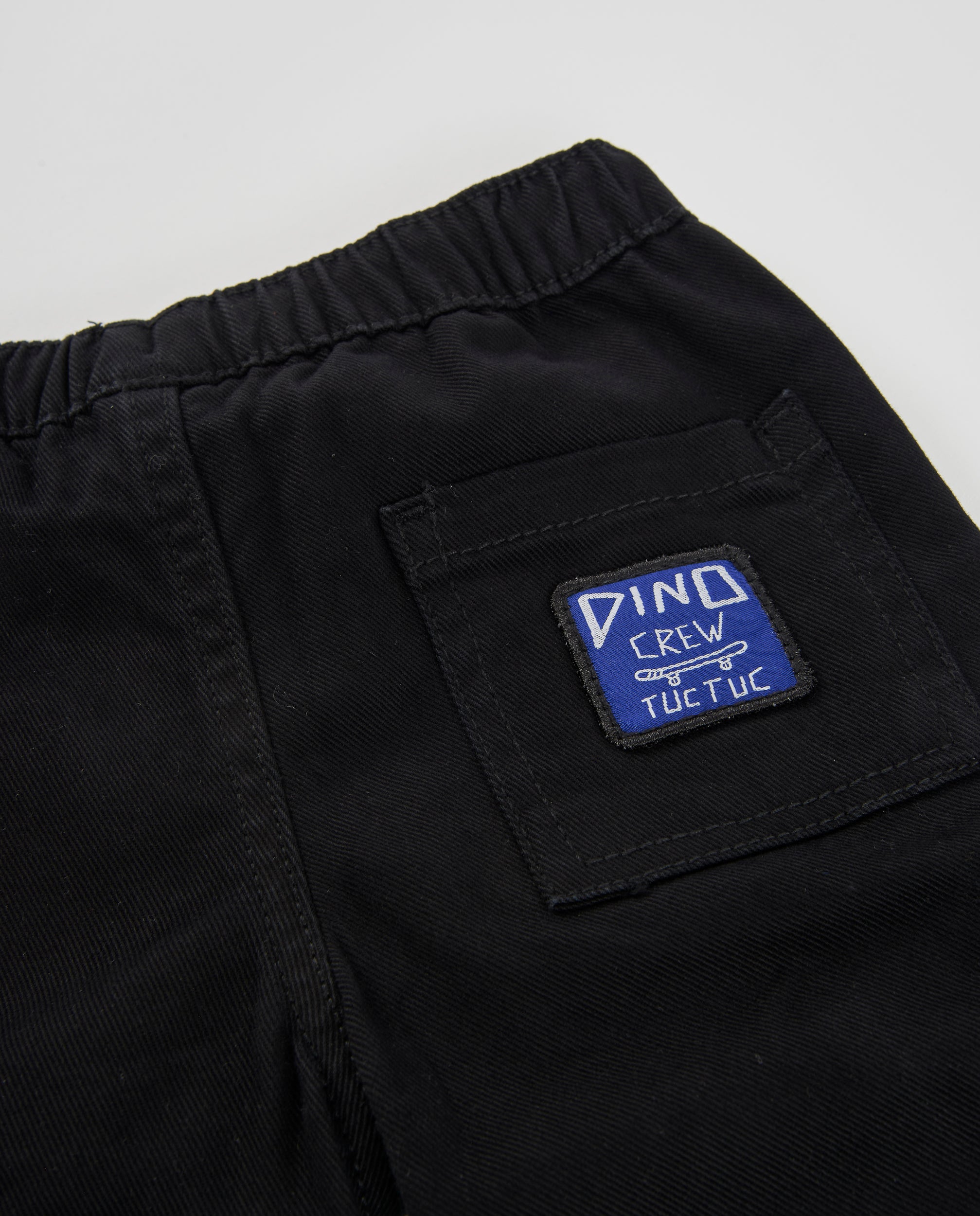 Pantalón jogger de niño de sarga con bolsillos y cordón ajustable