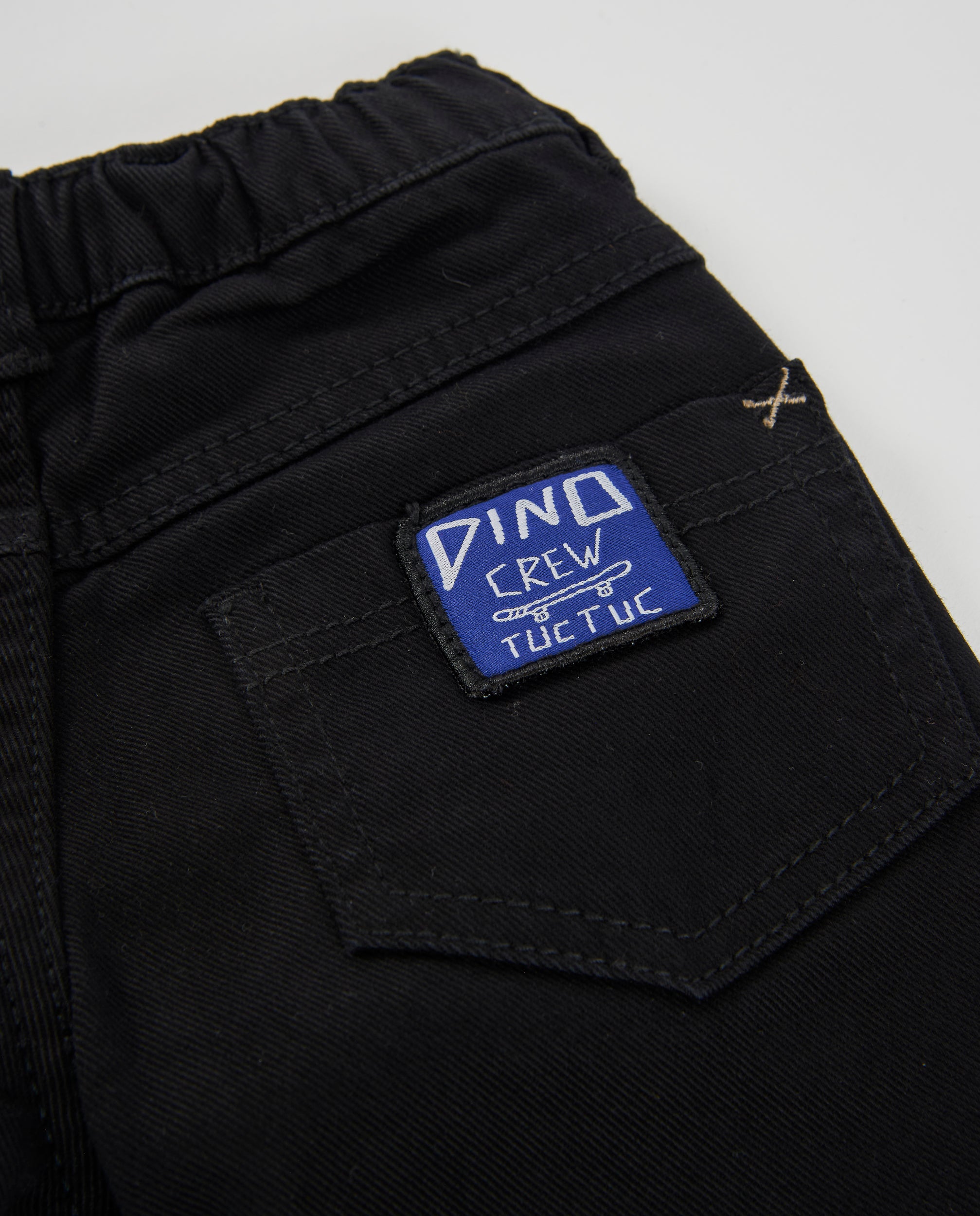 Pantalón de niño de sarga con cintura ajustable y diseño versátil