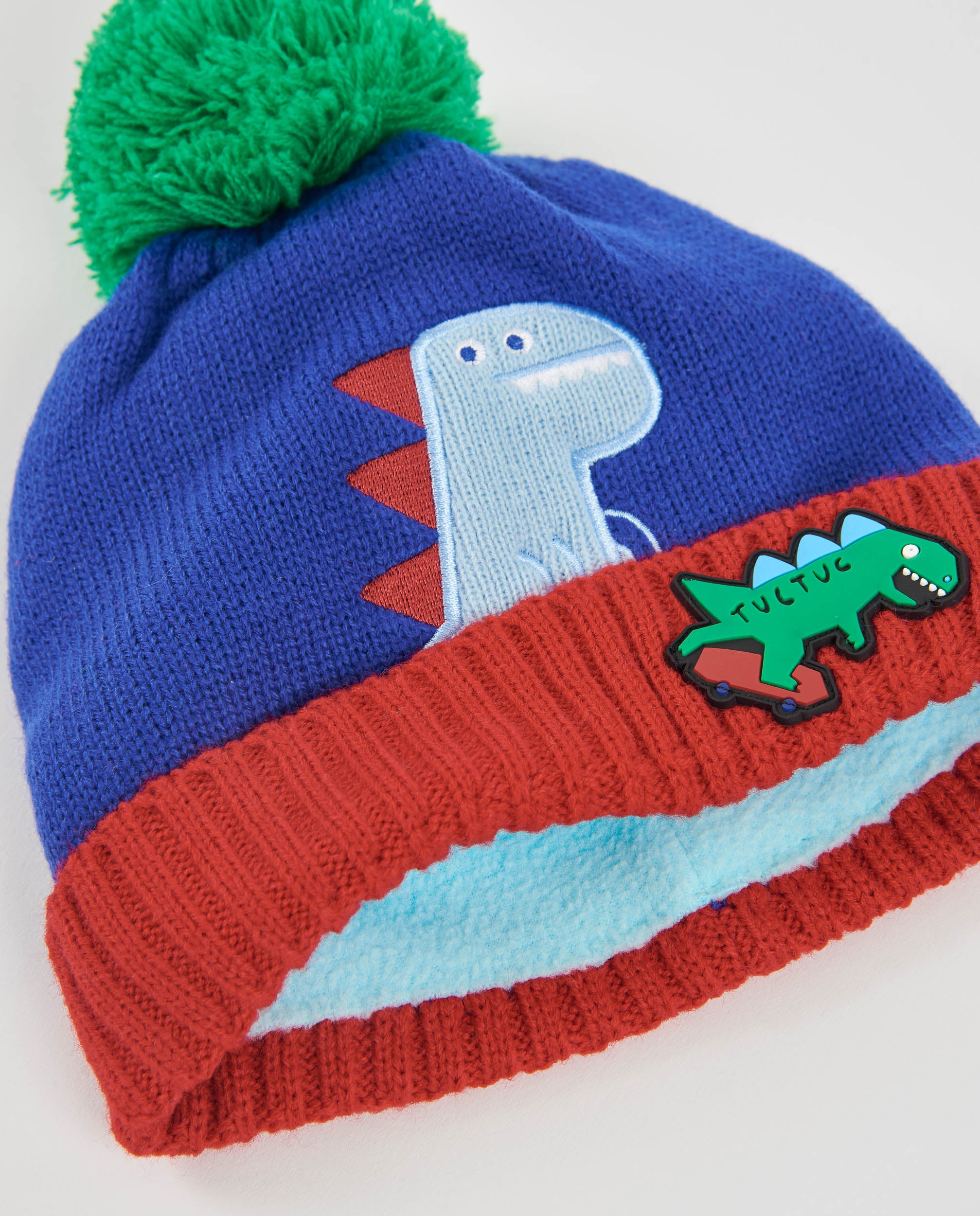 Set de niño de tricot con gorro y bufanda de diseño de dinosaurio