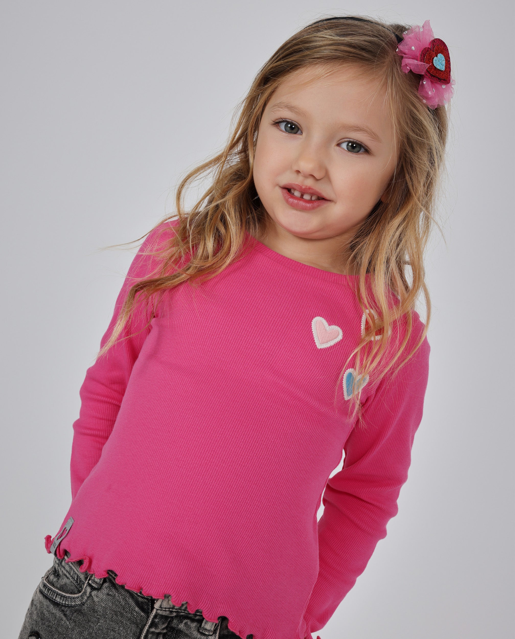 Camiseta de niña de punto con manga larga y volantes