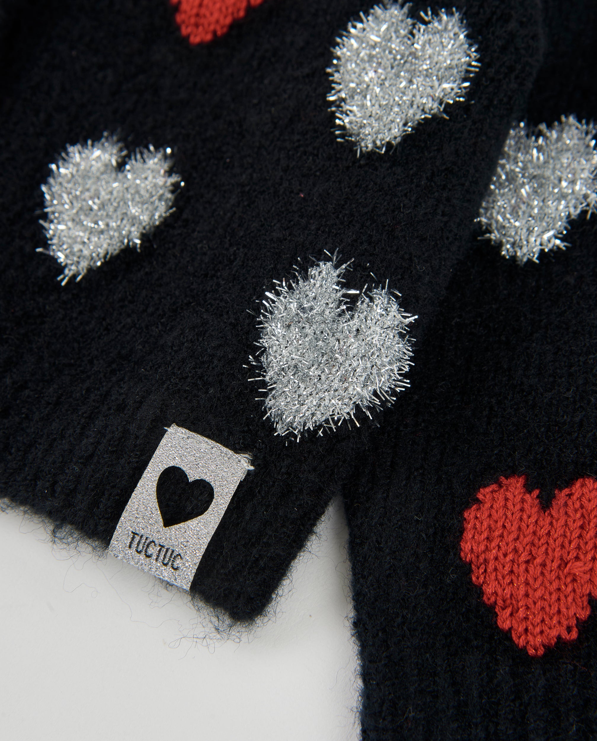 Chaqueta de niña de tricot con corazones y botones