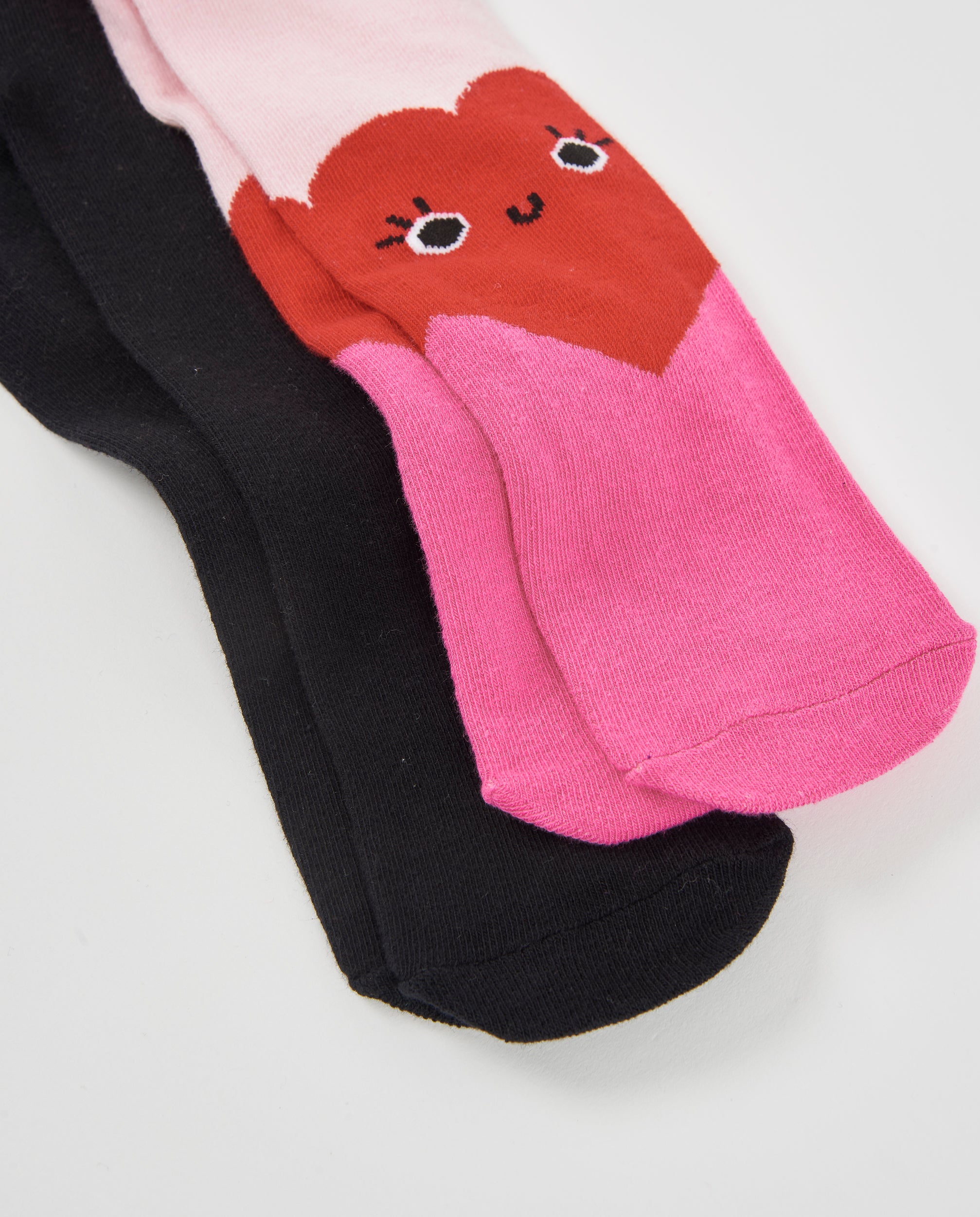 Leotardos de niña de punto con diseño de corazón y tejido elástico